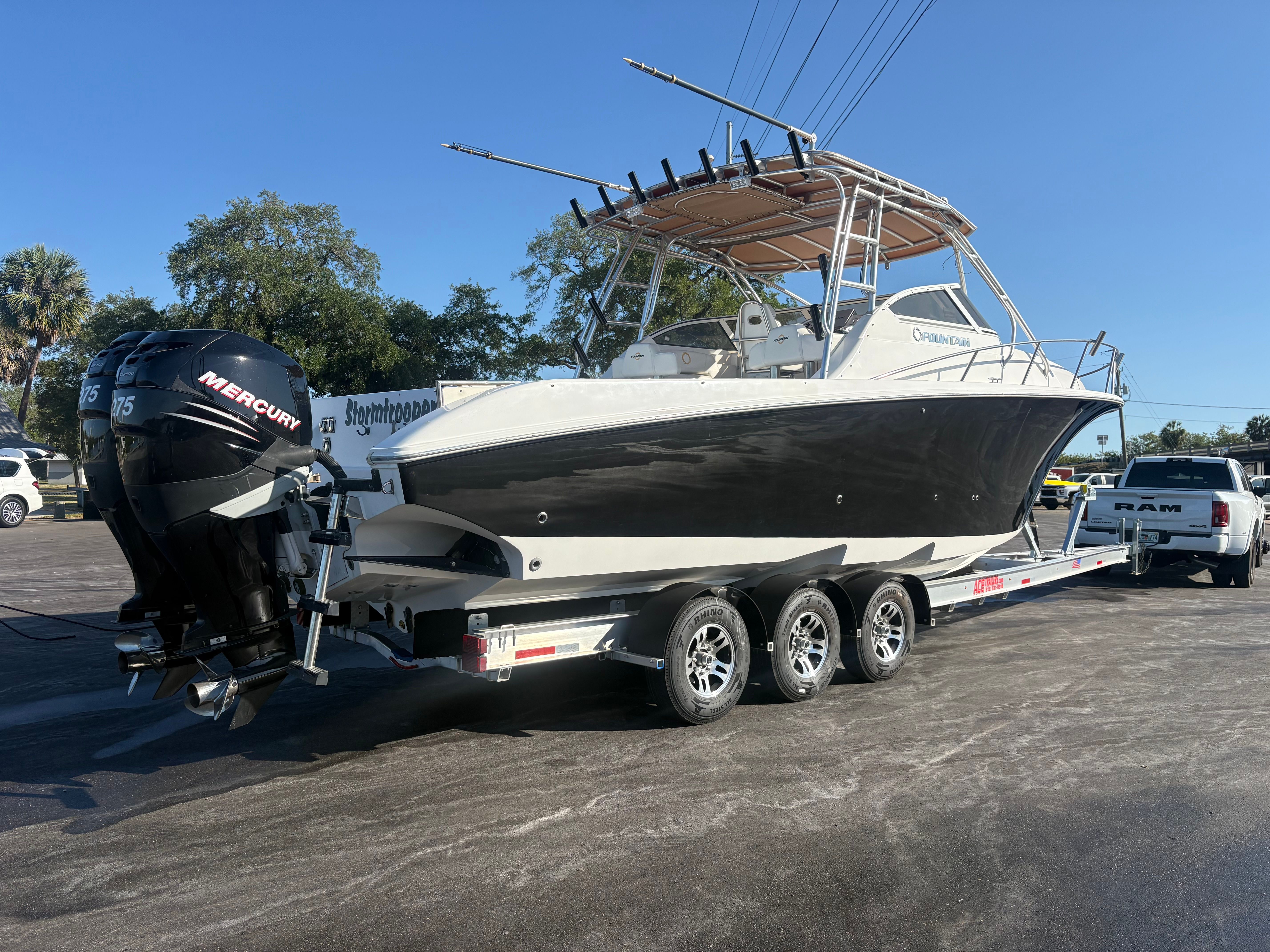 2009 Fountain 33 Sportfish Cruiser on trailer with Mercury engines.