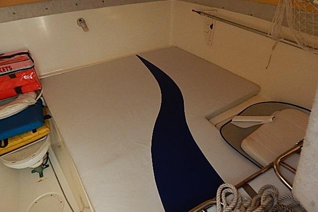 2003 World Cat 270 EC boat interior with storage and safety equipment.