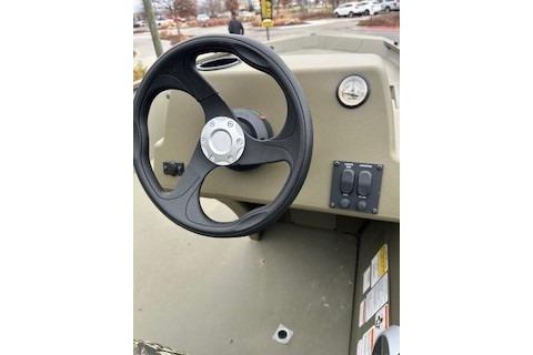 Steering wheel and dashboard of 2026 Tracker Grizzly 1754 SC boat.