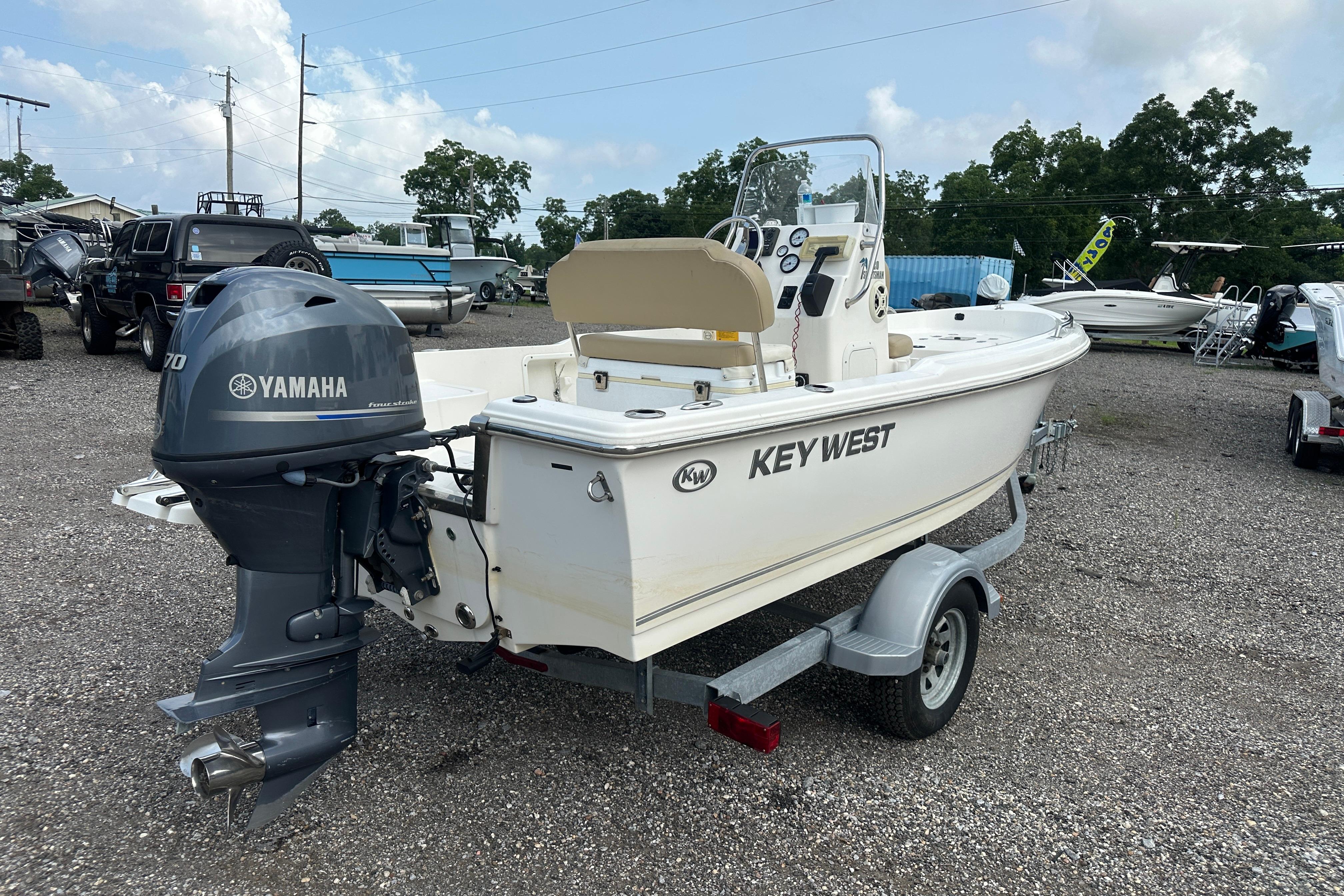 2018 Key West 1720 Center Console boat with Yamaha engine on trailer.