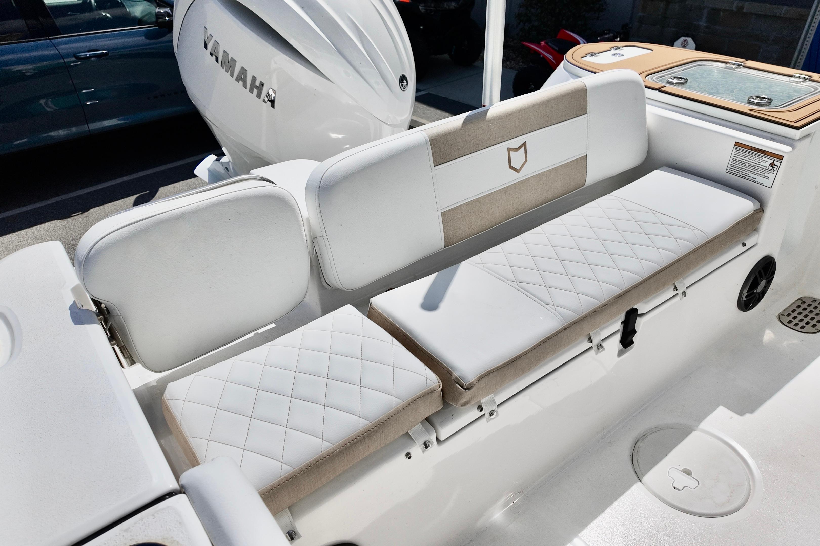 2026 Sea Fox 228 Commander boat interior with Yamaha engine and cushioned seating.