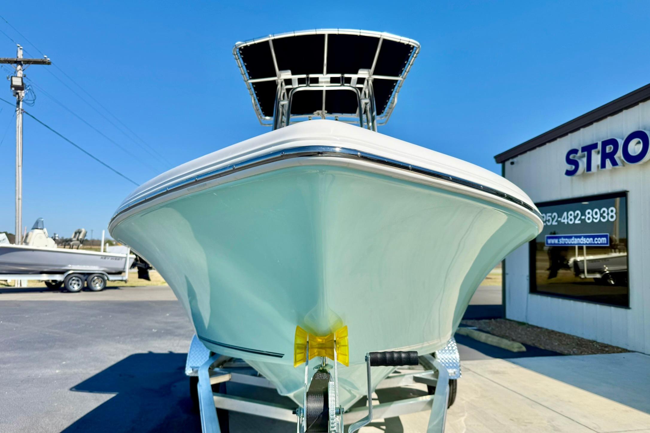 2026 Key West 189 FS boat on trailer, displayed outdoors under clear blue sky.