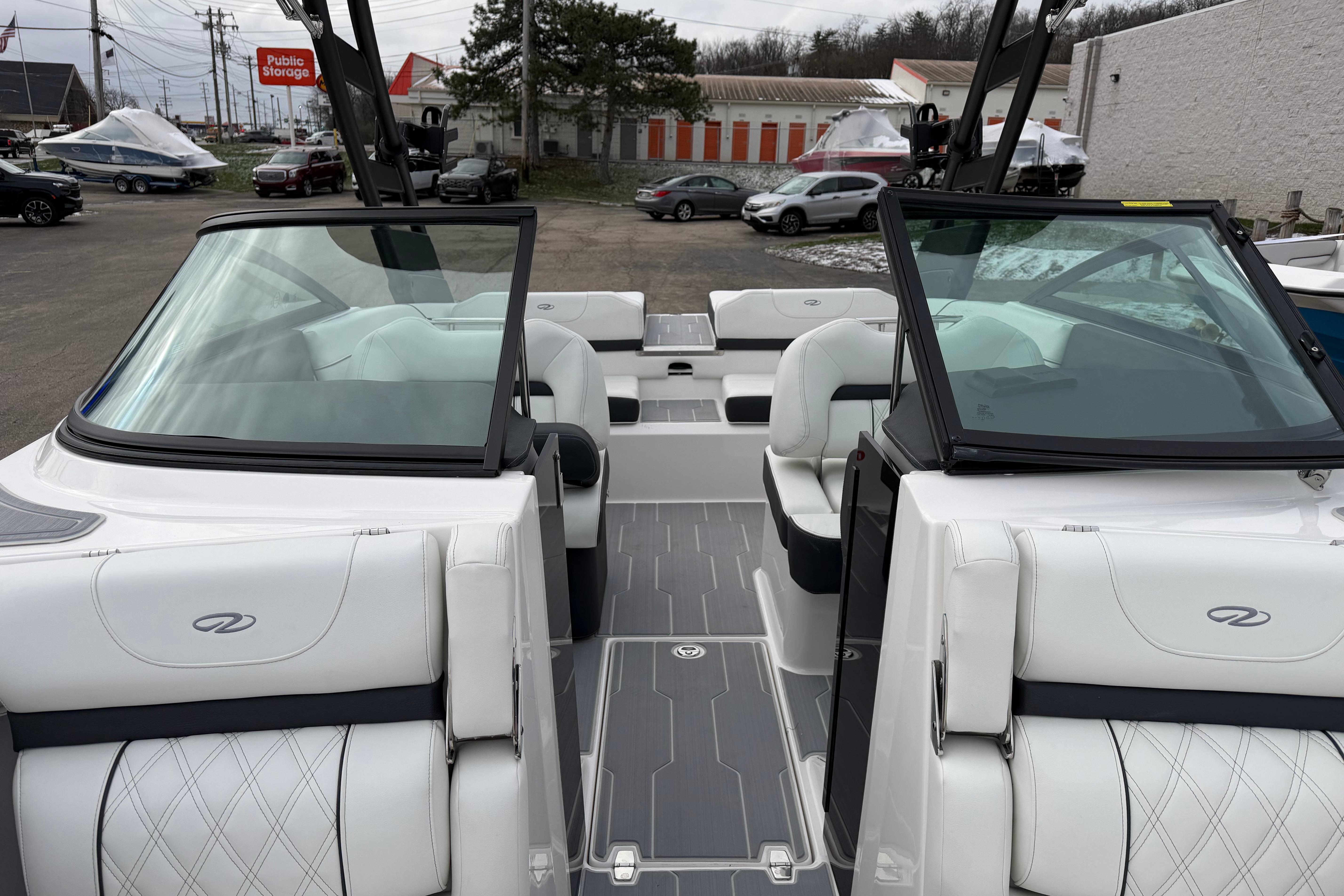 2026 Regal LS2 Surf boat interior with white seating and sleek design.