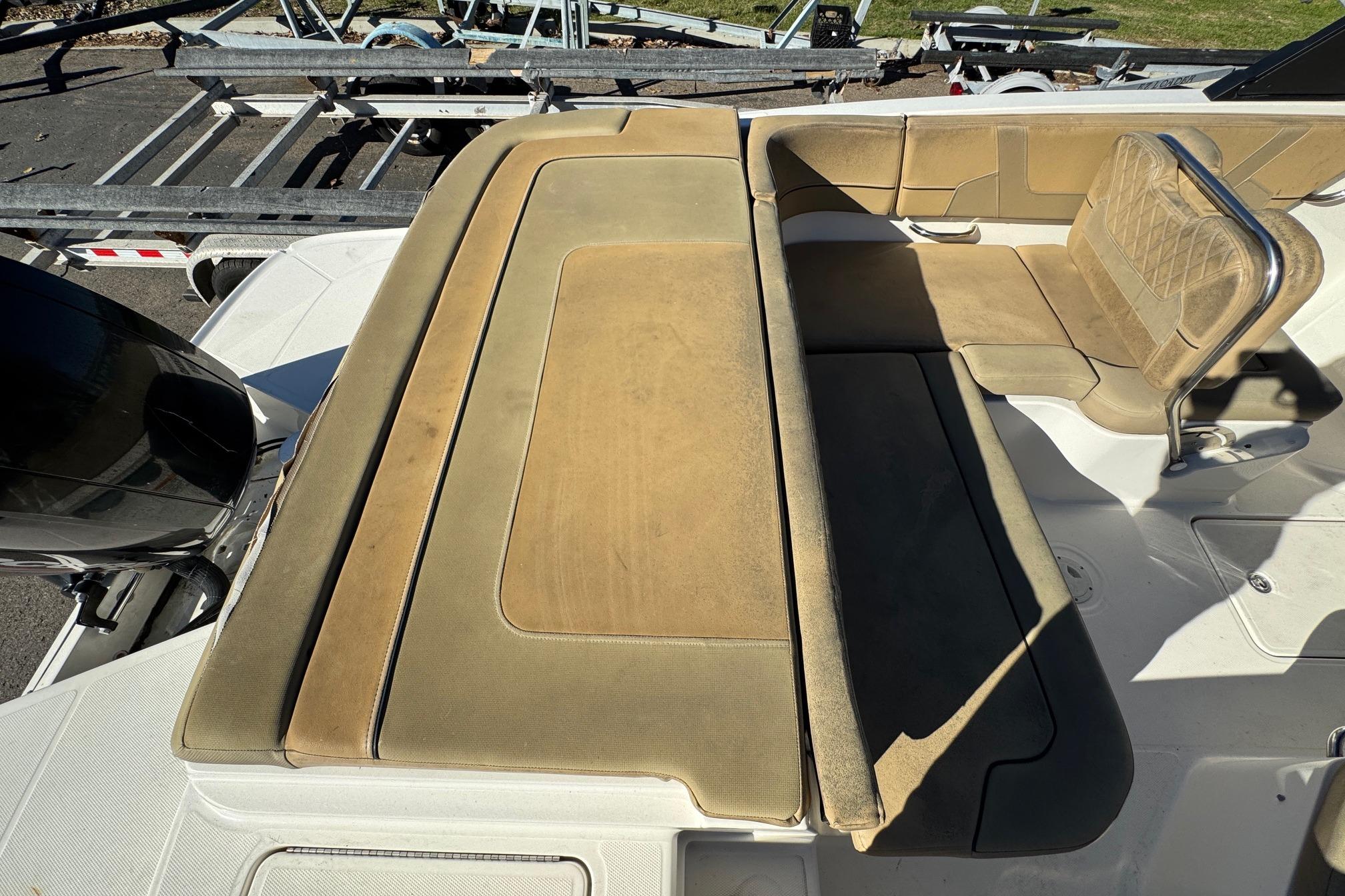 2022 Bayliner VR6 Bowrider OB with tan seating and outboard motor.