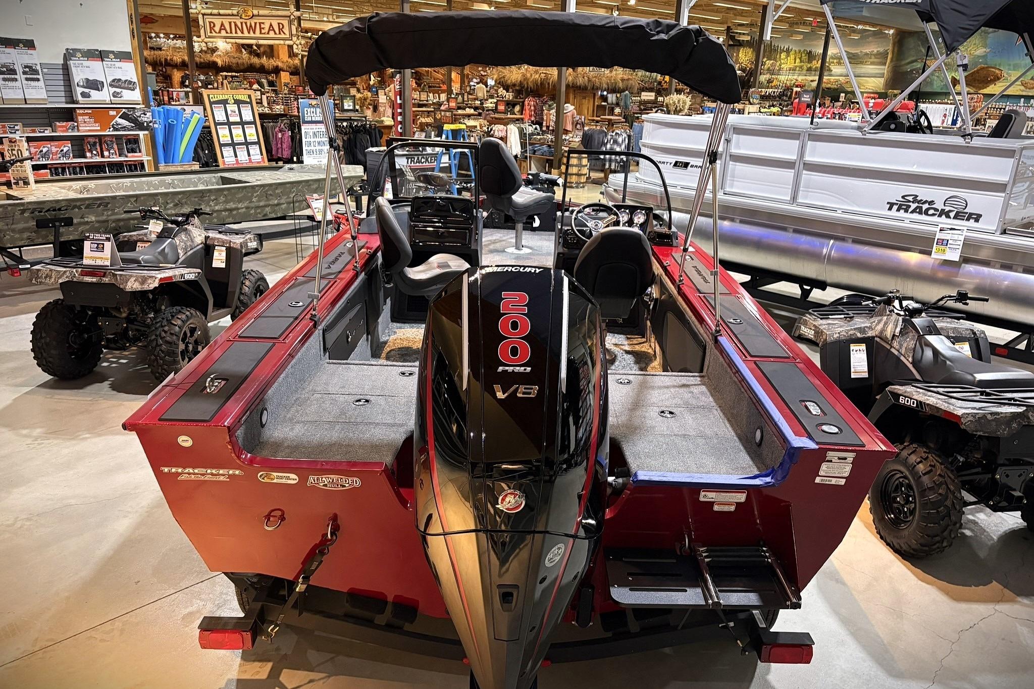 2025 Tracker Targa V-19 WT boat with Mercury 200 engine in showroom display.
