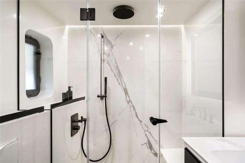 Luxurious bathroom in 2026 Sunreef 80 Sunreef Power yacht with modern shower design.