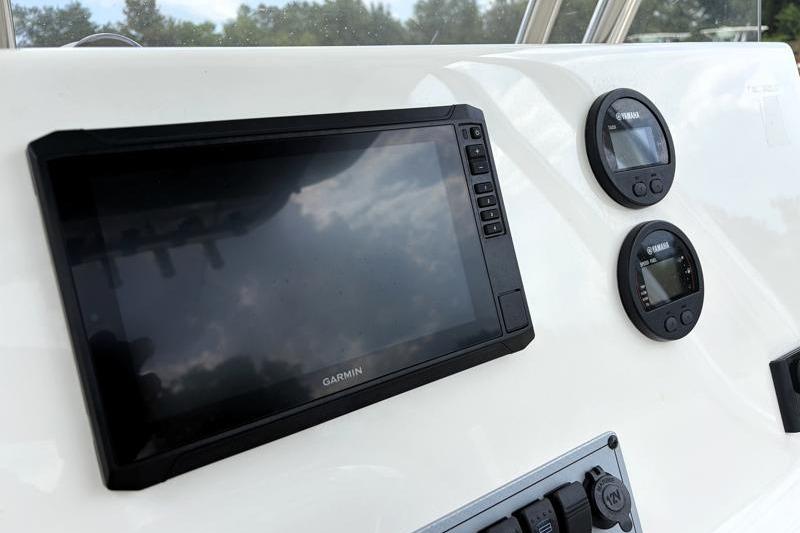 2024 Key West 239 FS boat dashboard with Garmin and Yamaha displays.