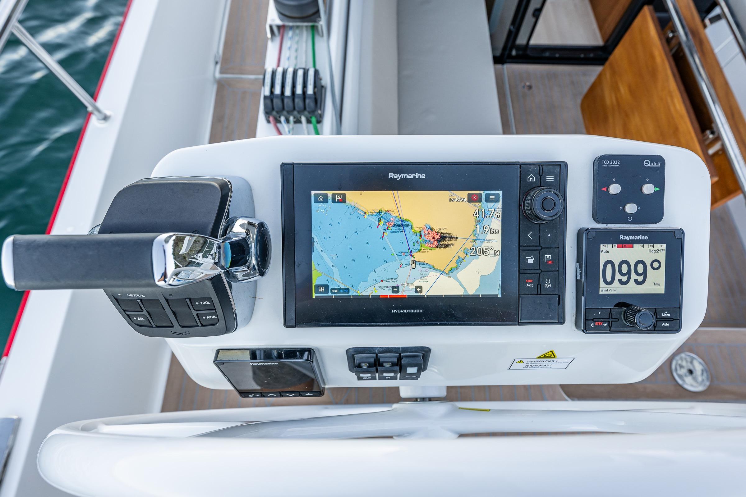 Control panel of 2024 Moody 41ds yacht with navigation display and throttle.
