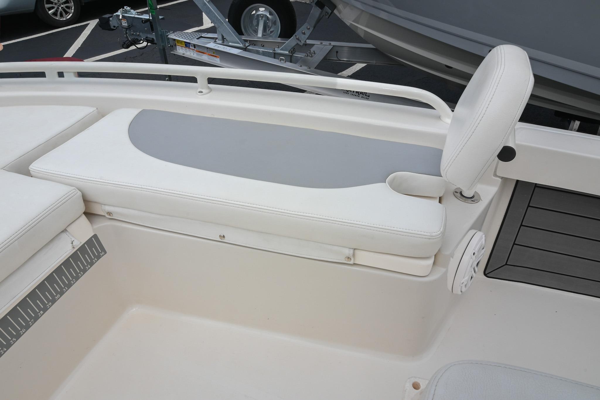 2021 Pathfinder 2200 TRS boat interior with cushioned seating and cup holder.