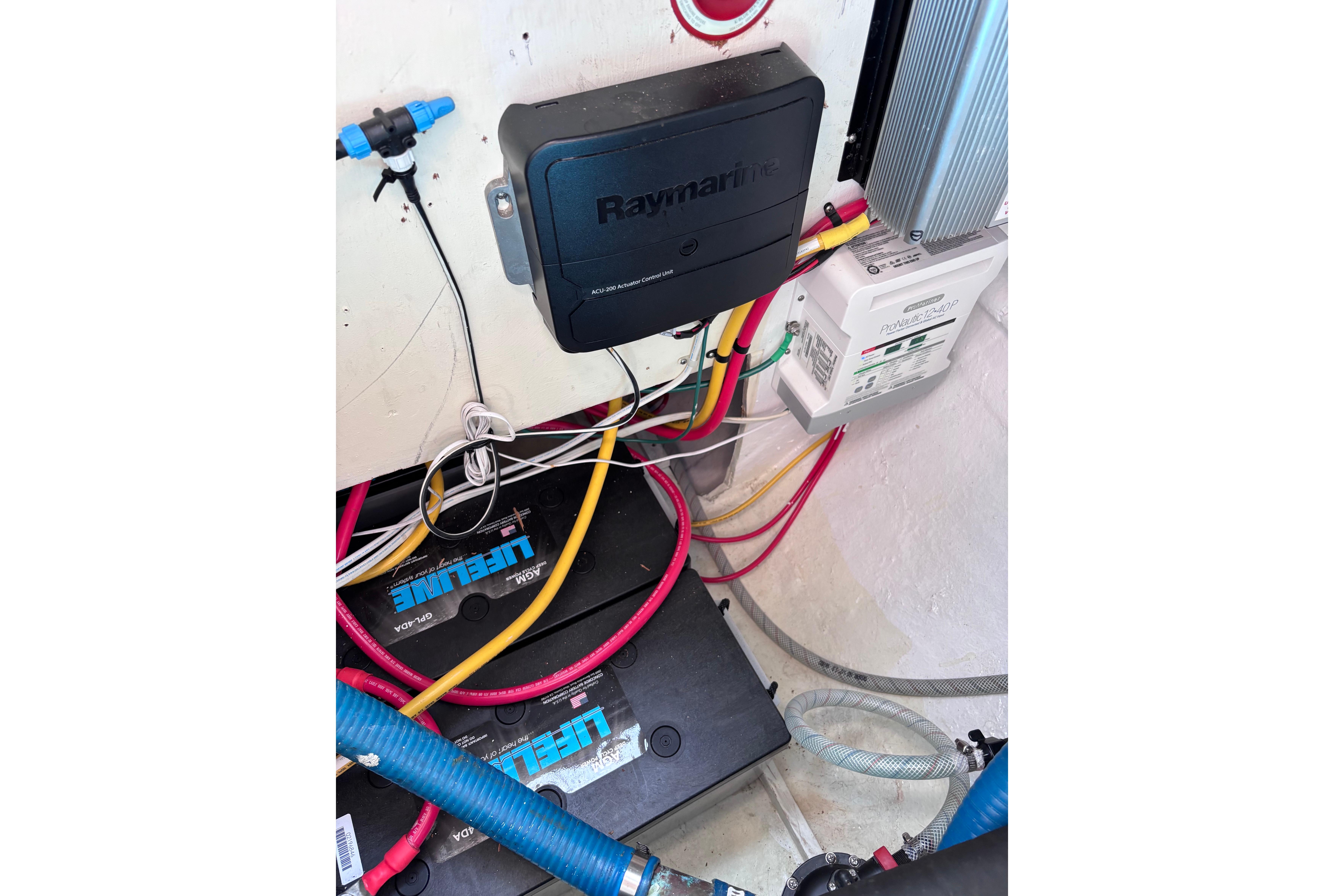 Electrical system setup in a 1978 Swift 33 boat, featuring Raymarine components and Lifeline batteries.