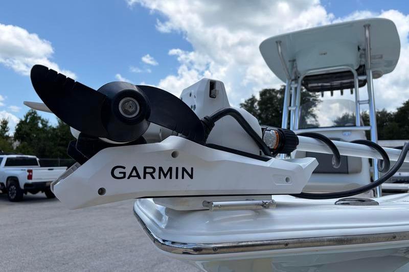 Garmin trolling motor on 2025 Key West 210 Bay Reef boat under blue sky.