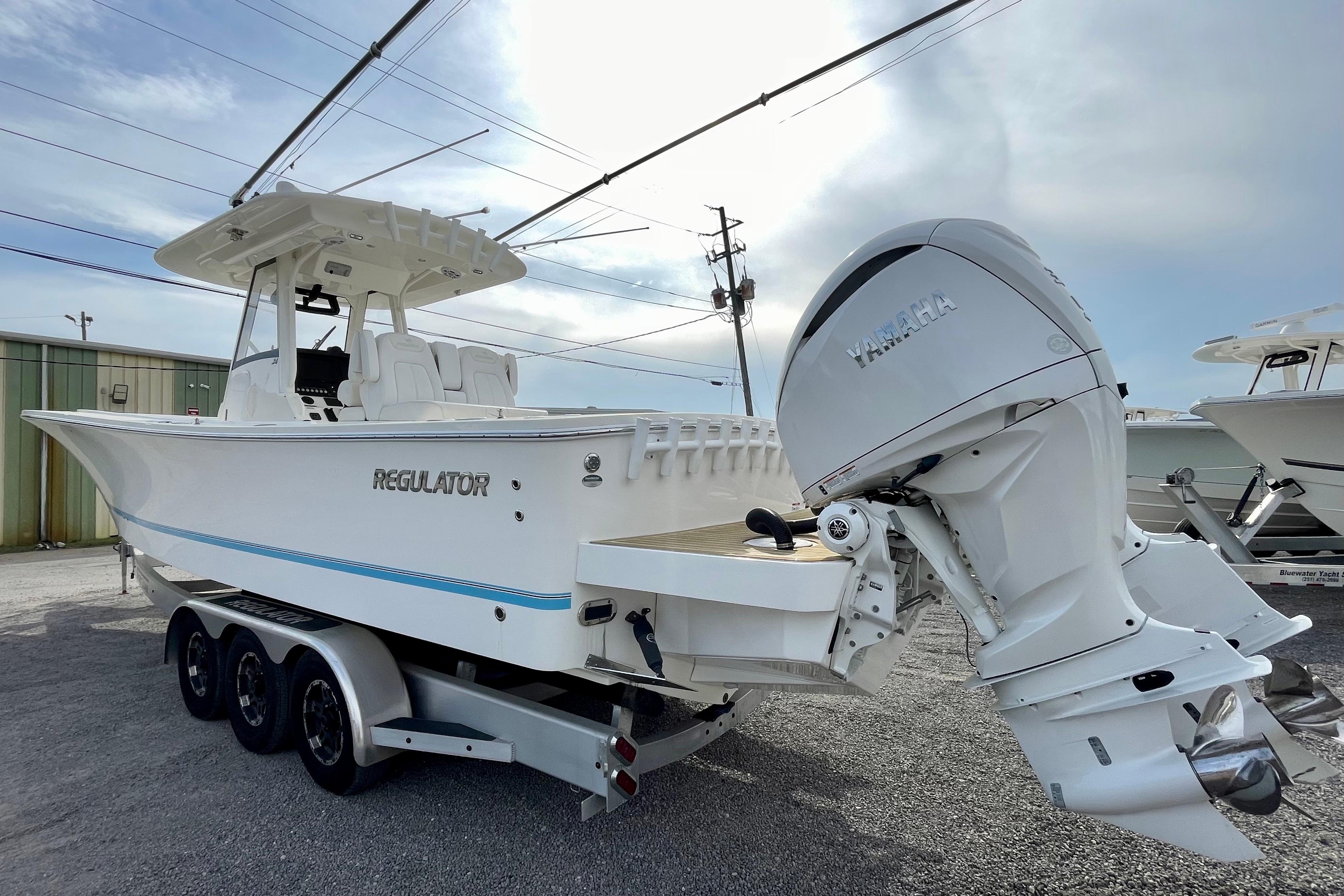2023 Regulator 34 boat with Yamaha outboard engine on a trailer.