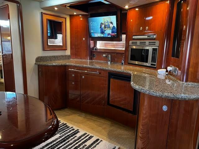 Luxurious kitchen in a 2006 Sea Ray 44 Sundancer yacht.