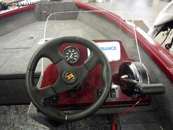 2025 Ranger VS1665 SC boat dashboard with steering wheel and control panel.