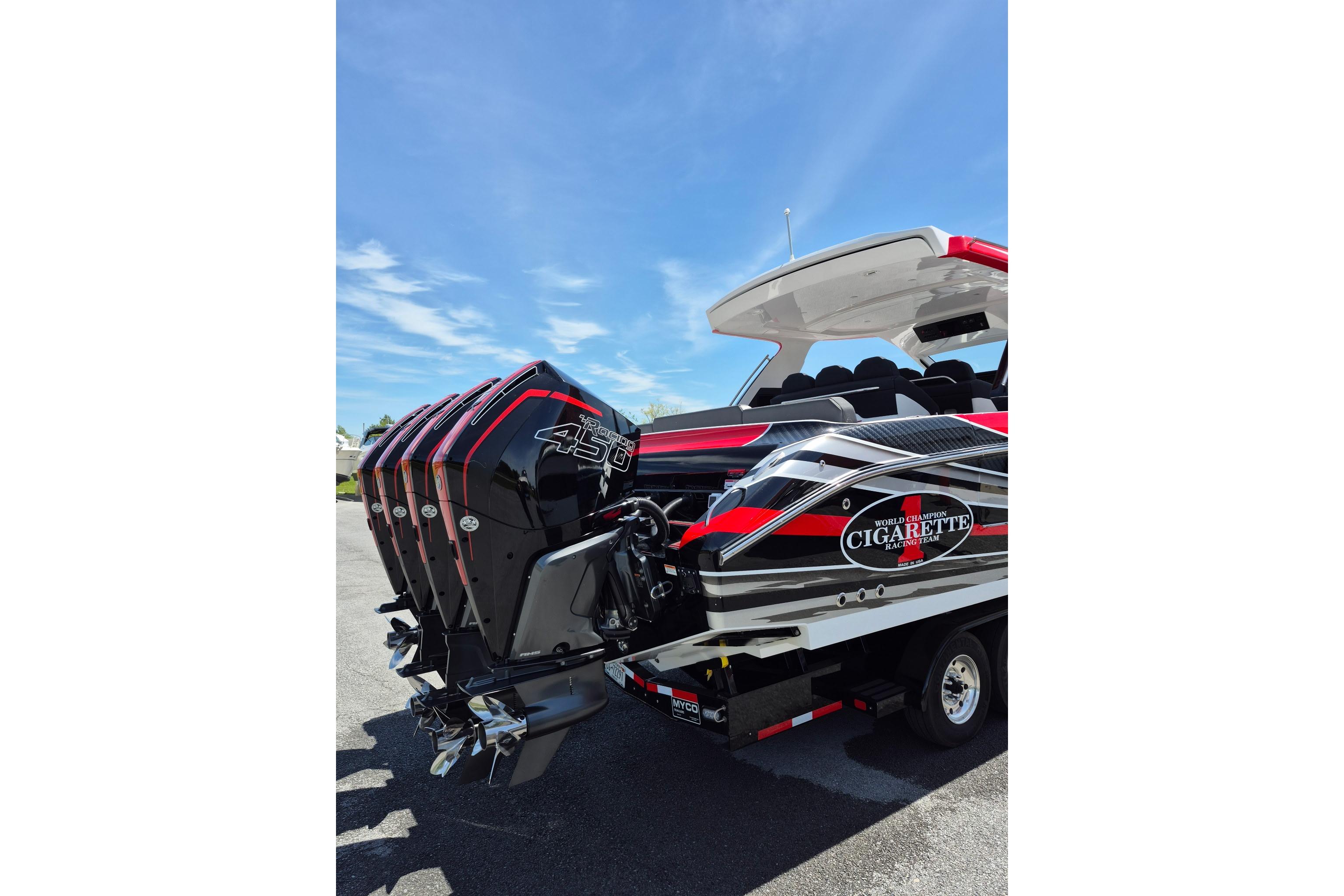 2021 Cigarette 41' Nighthawk boat with powerful engines, sleek design, and vibrant graphics.