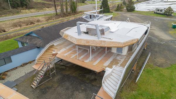 2025 Catamaran Bloomfield 86 Motorsailor under construction, aerial view.