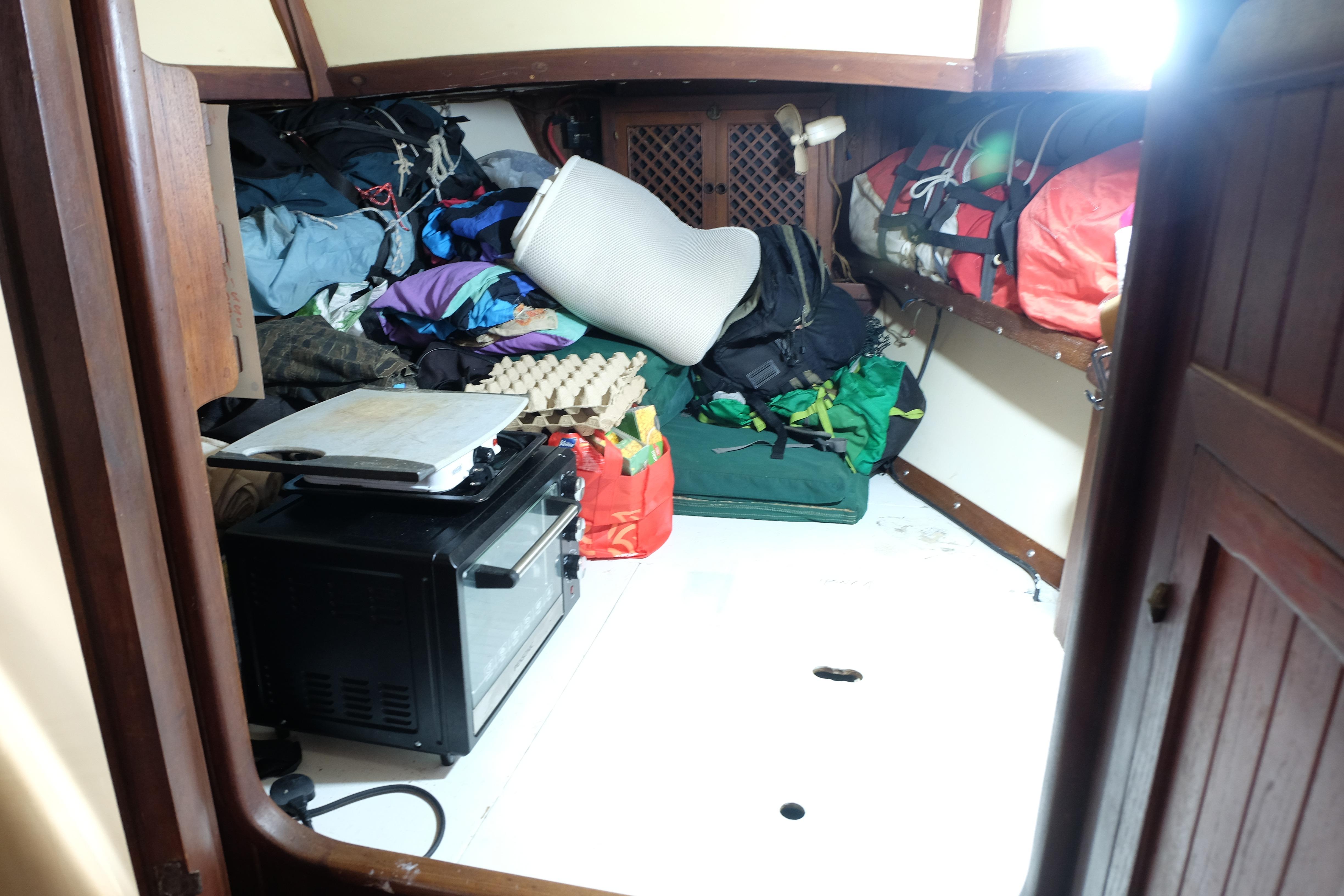 Interior of a 1979 Westwind 35 sailboat with storage and equipment.