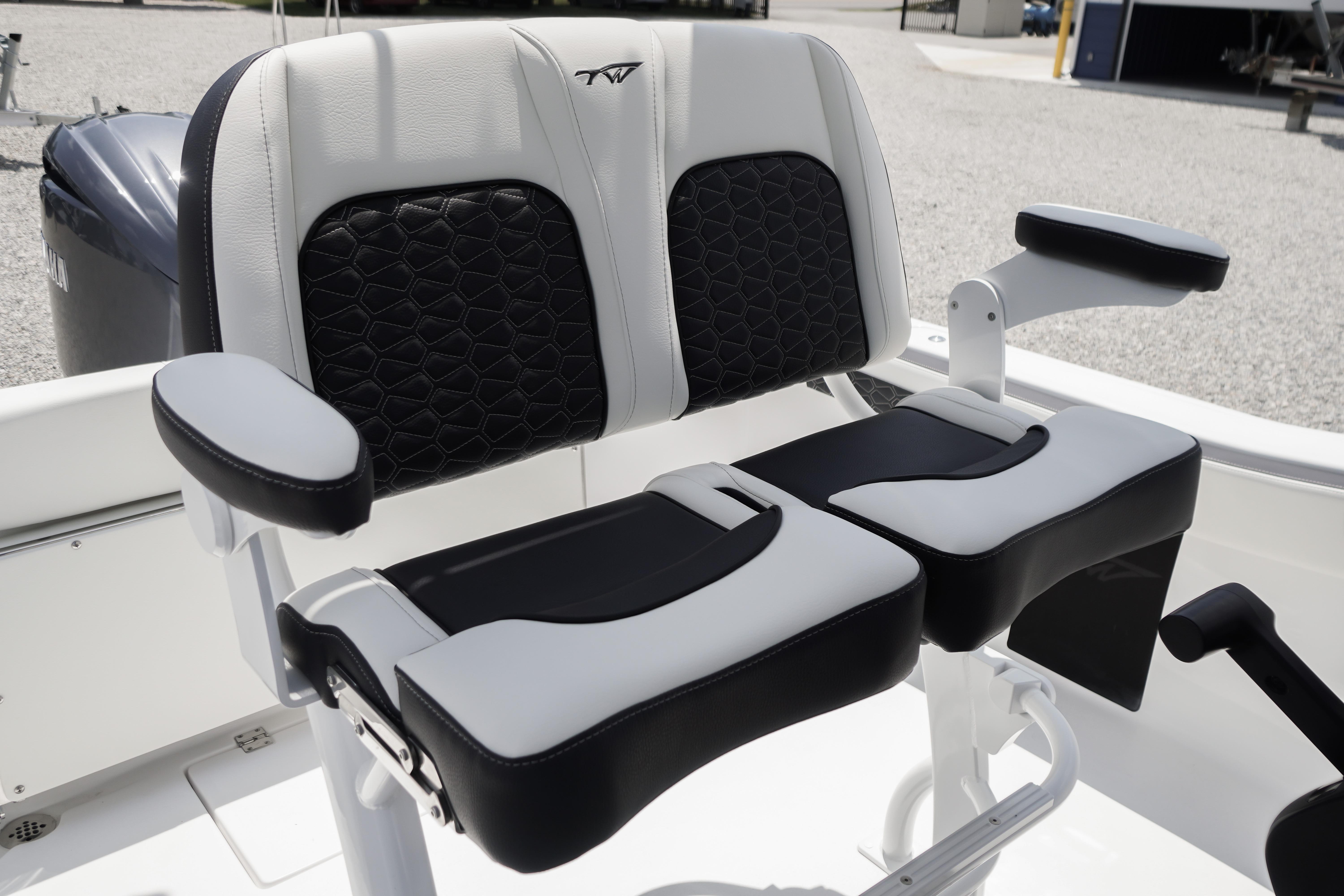 2027 Tidewater 220 CC Adventure boat seating with black and white upholstery.