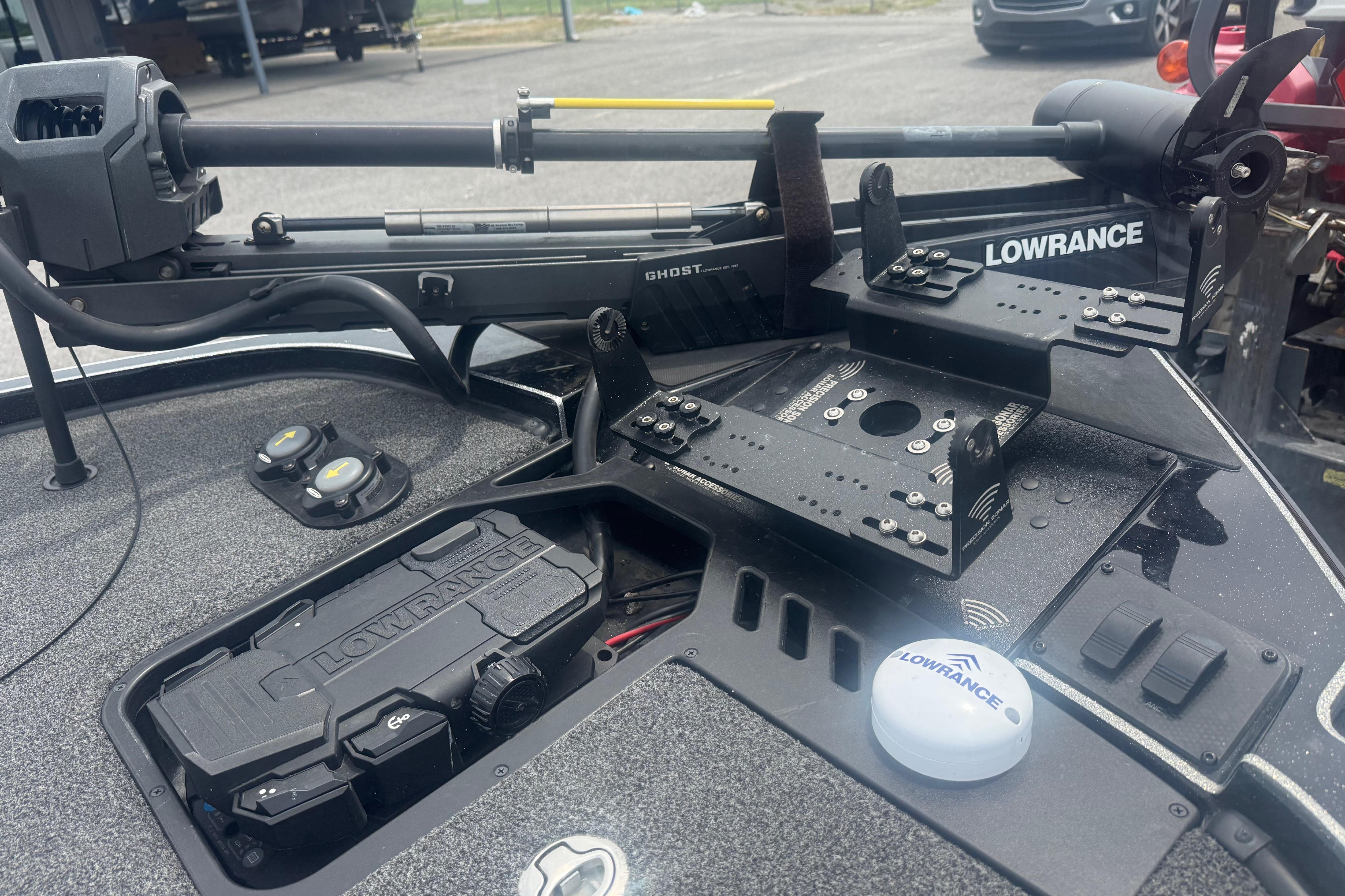 2024 Triton 20XP boat with Lowrance electronics and Ghost trolling motor setup.