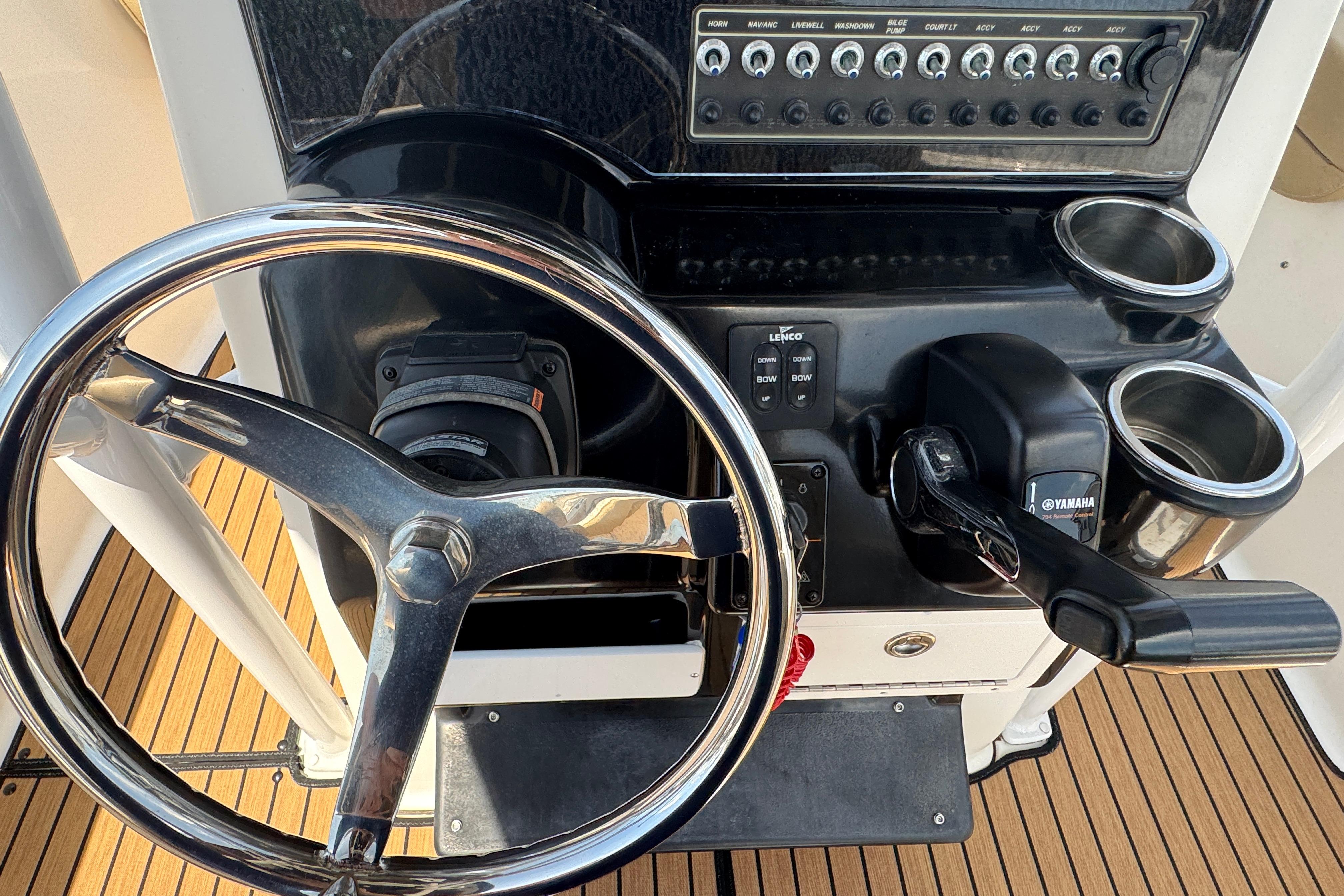 Steering console of 2016 Tidewater 230 LXF boat with Yamaha controls.