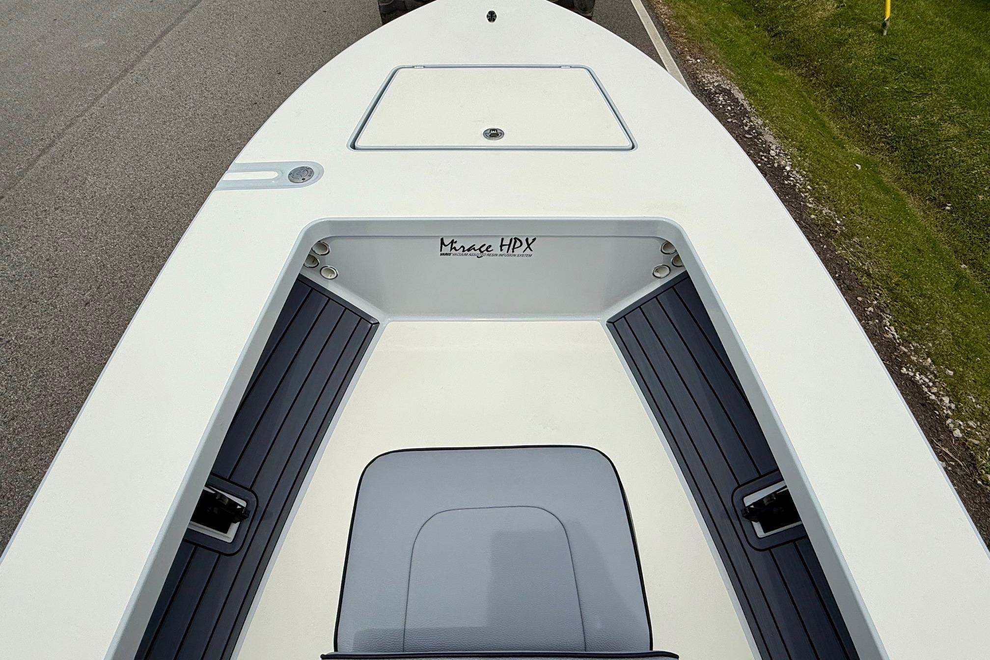2026 Maverick 17 HPX-S boat deck with storage compartments and sleek design.
