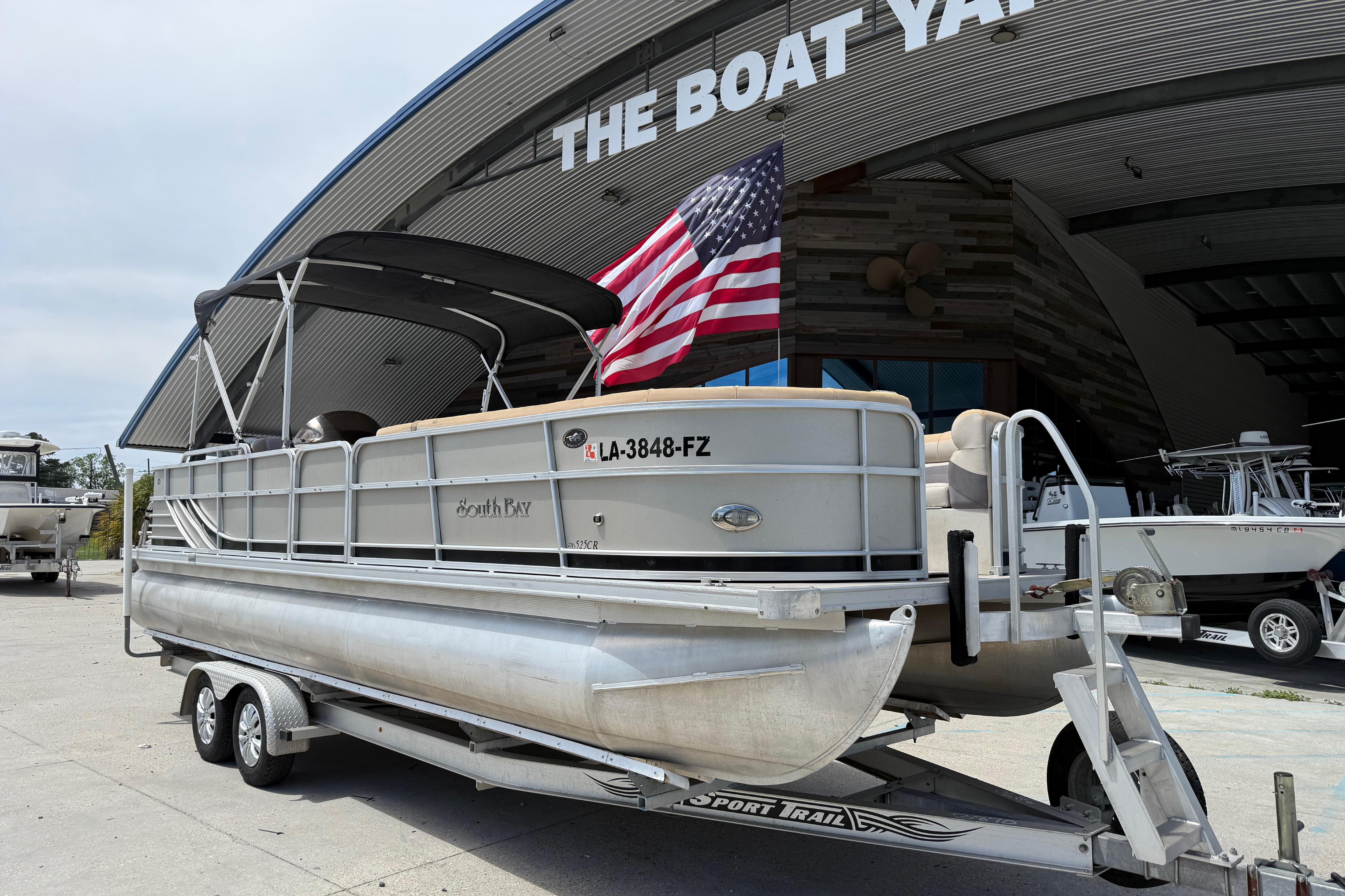 2012 South Bay 522 CR pontoon boat on trailer at The Boat Yard.