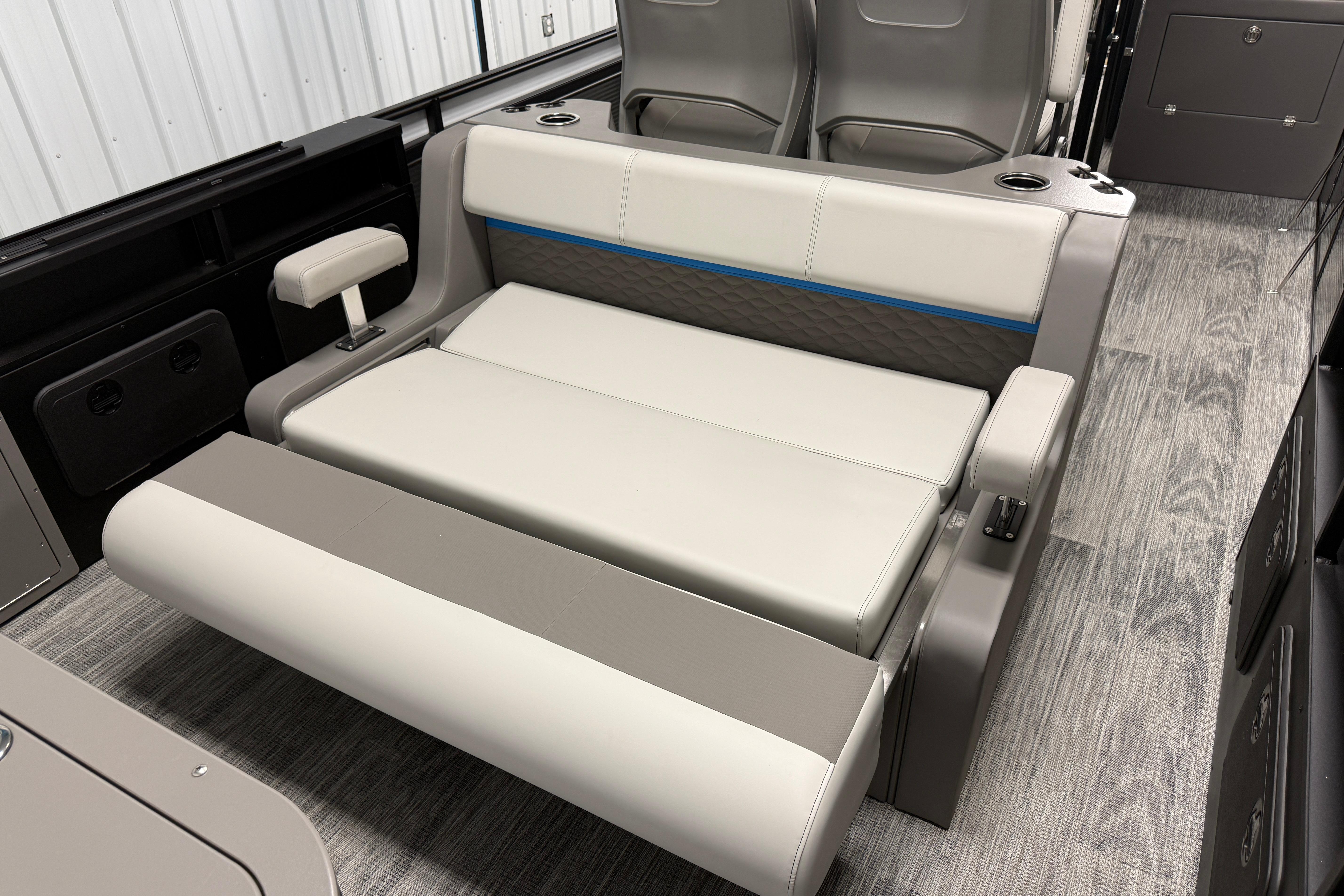 2026 Qwest M-Class 22 Pro Sport interior with convertible seating and modern design.