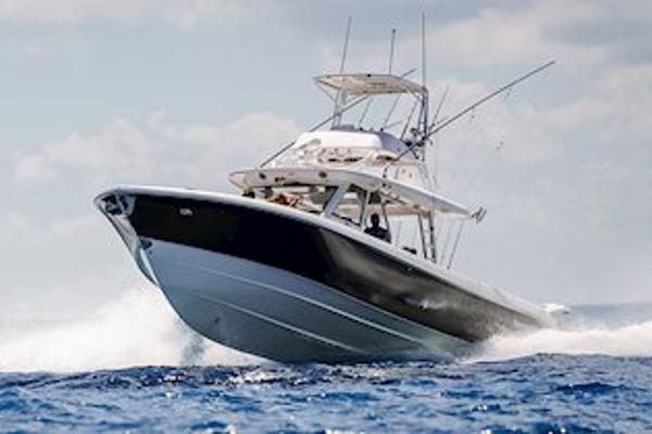Manufacturer Provided Image: 2025 Everglades 455 Center Console boat cruising on open water.