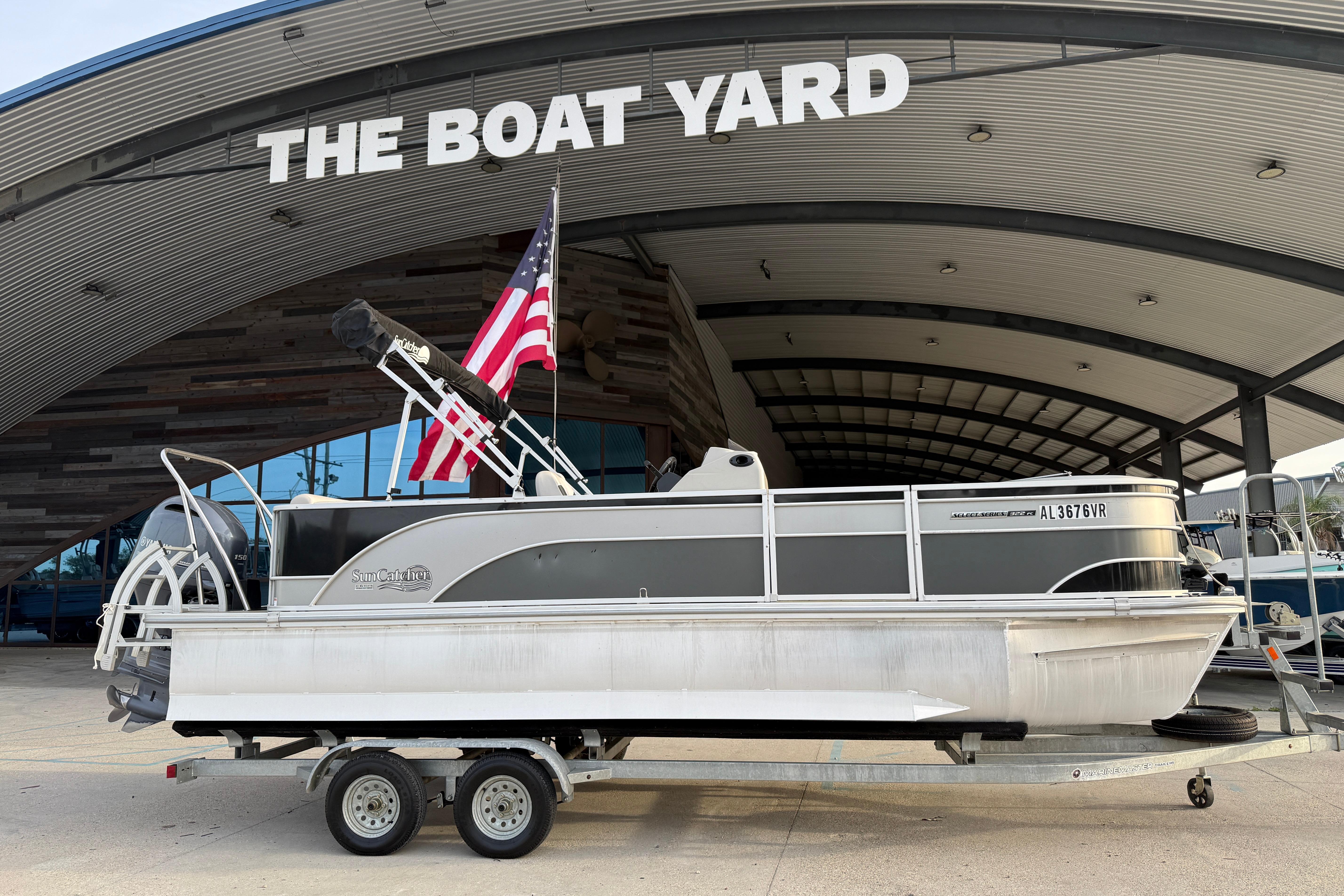 2022 Custom G3 Suncatcher 322FC pontoon boat on trailer at The Boat Yard.