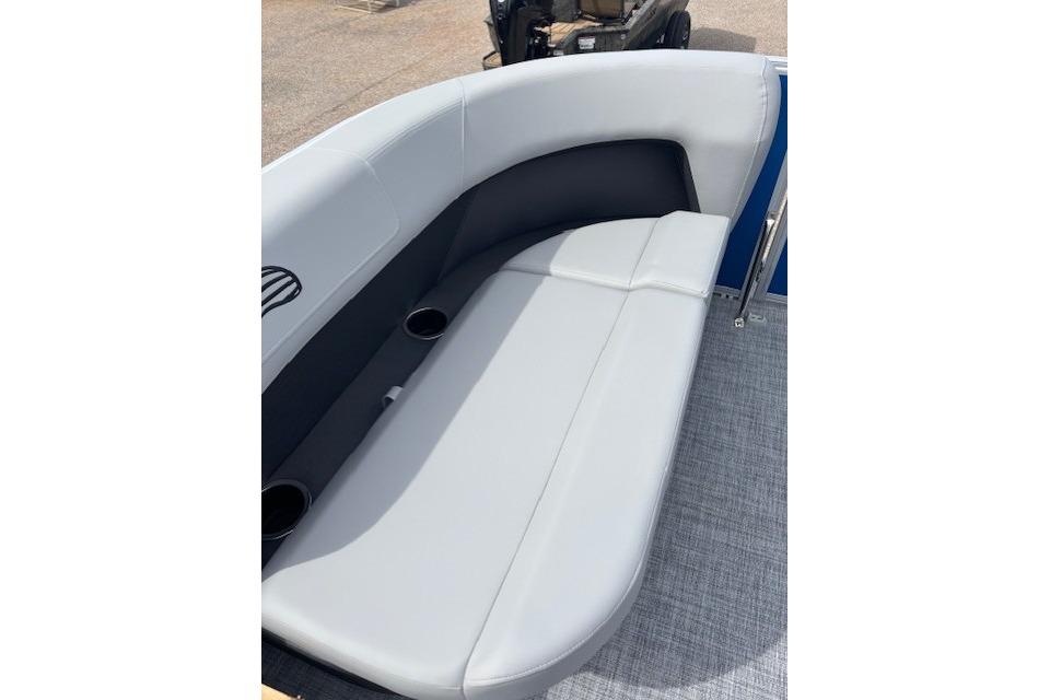 2026 Sun Tracker Party Barge 16 DLX boat seating with cup holders and sleek design.