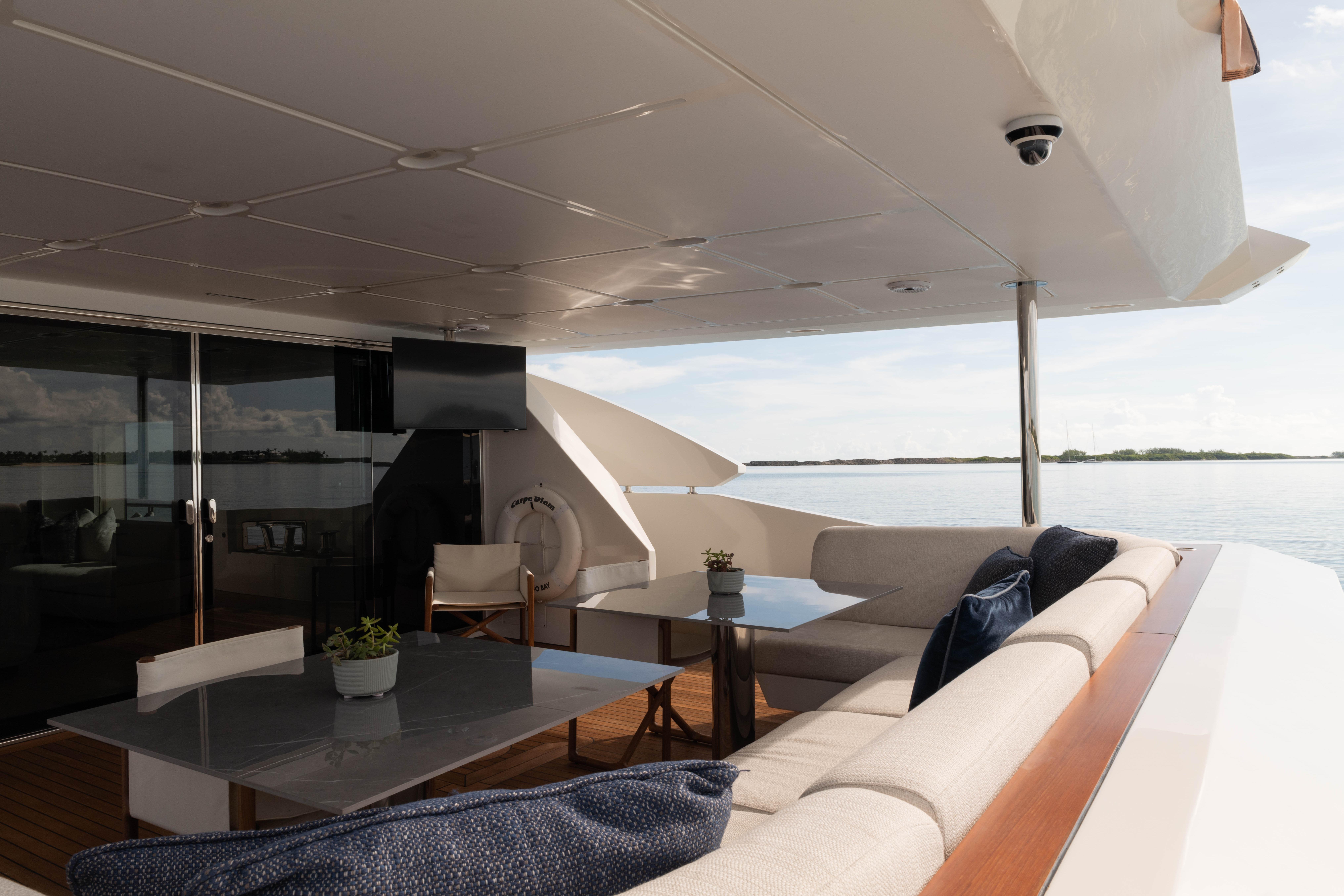 Luxurious 2023 Azimut yacht deck with elegant seating and ocean view.