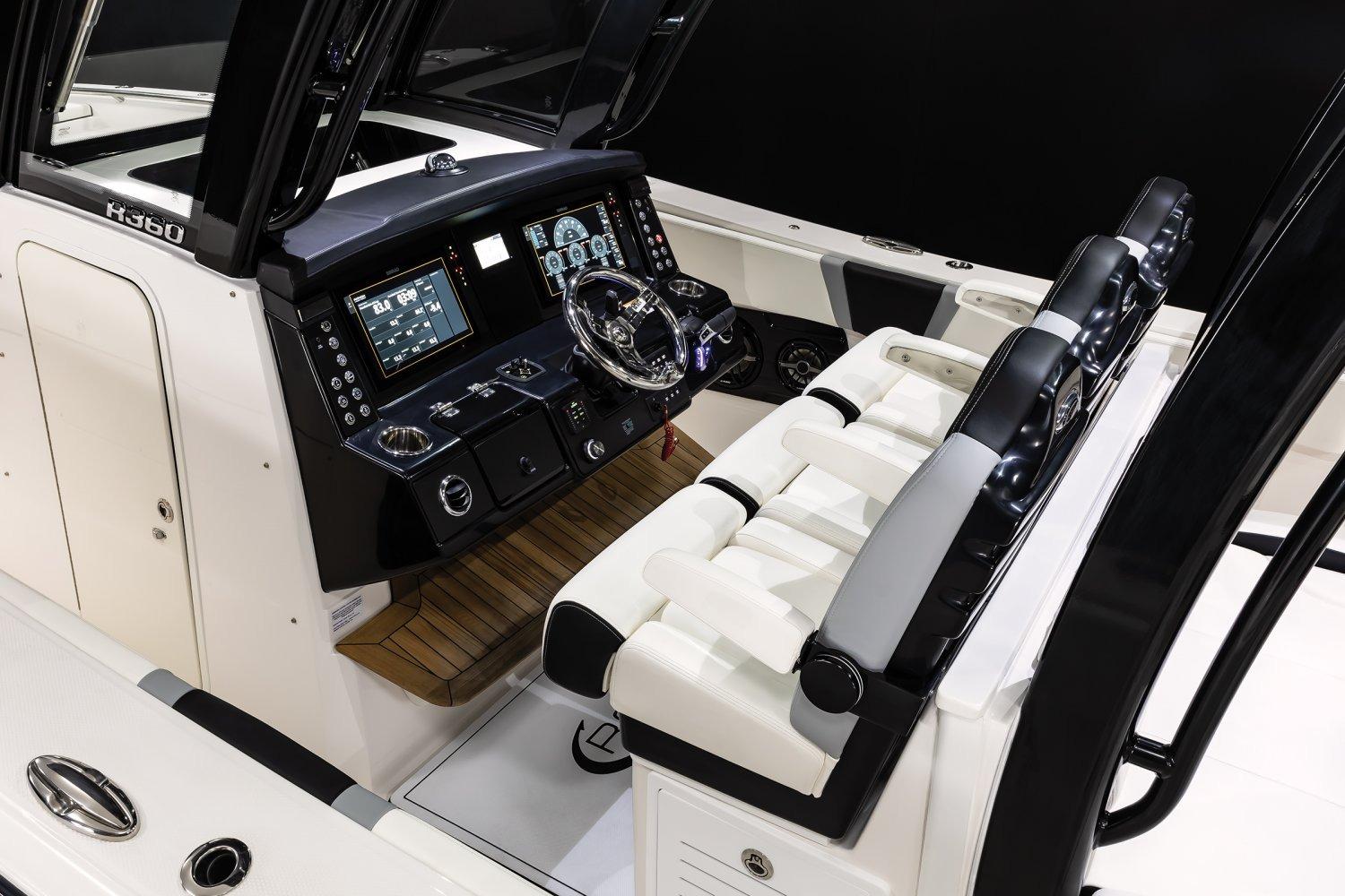 Manufacturer Provided Image: 2026 Robalo R360 Center Console boat interior with advanced navigation controls and seating.
