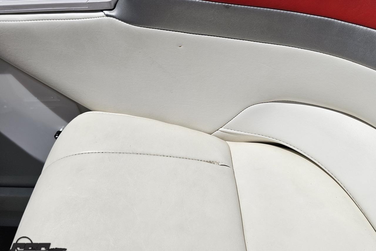 2005 Formula 271 FASTech boat interior with white and red upholstery detail.