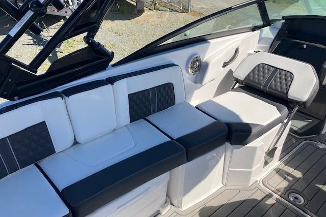 2024 Monterey M-65 boat interior with sleek seating and modern design.