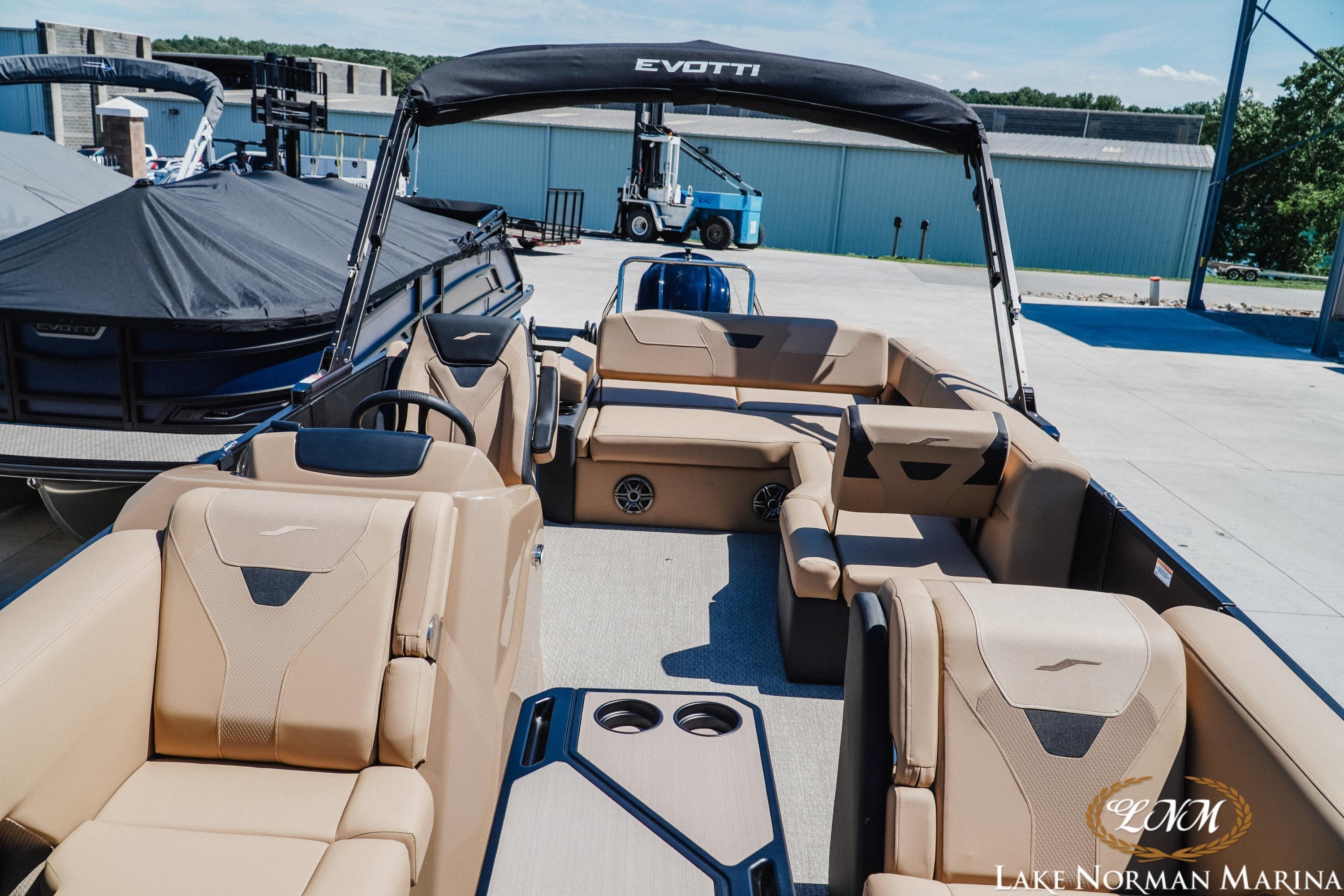 2026 Evotti 523CS pontoon boat with luxurious seating at Lake Norman Marina.