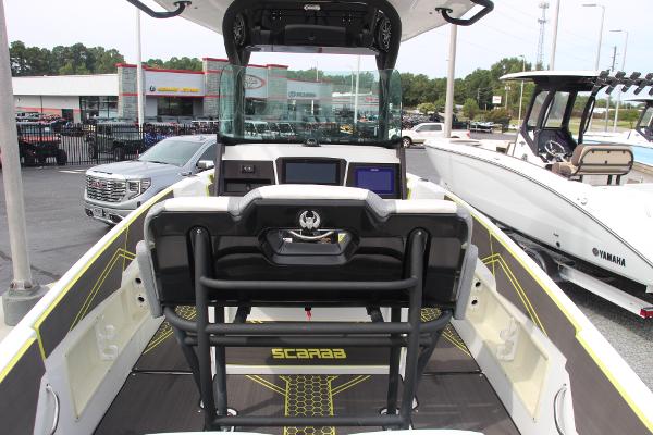 2023 Scarab 255 Open ID boat interior with modern dashboard and seating.