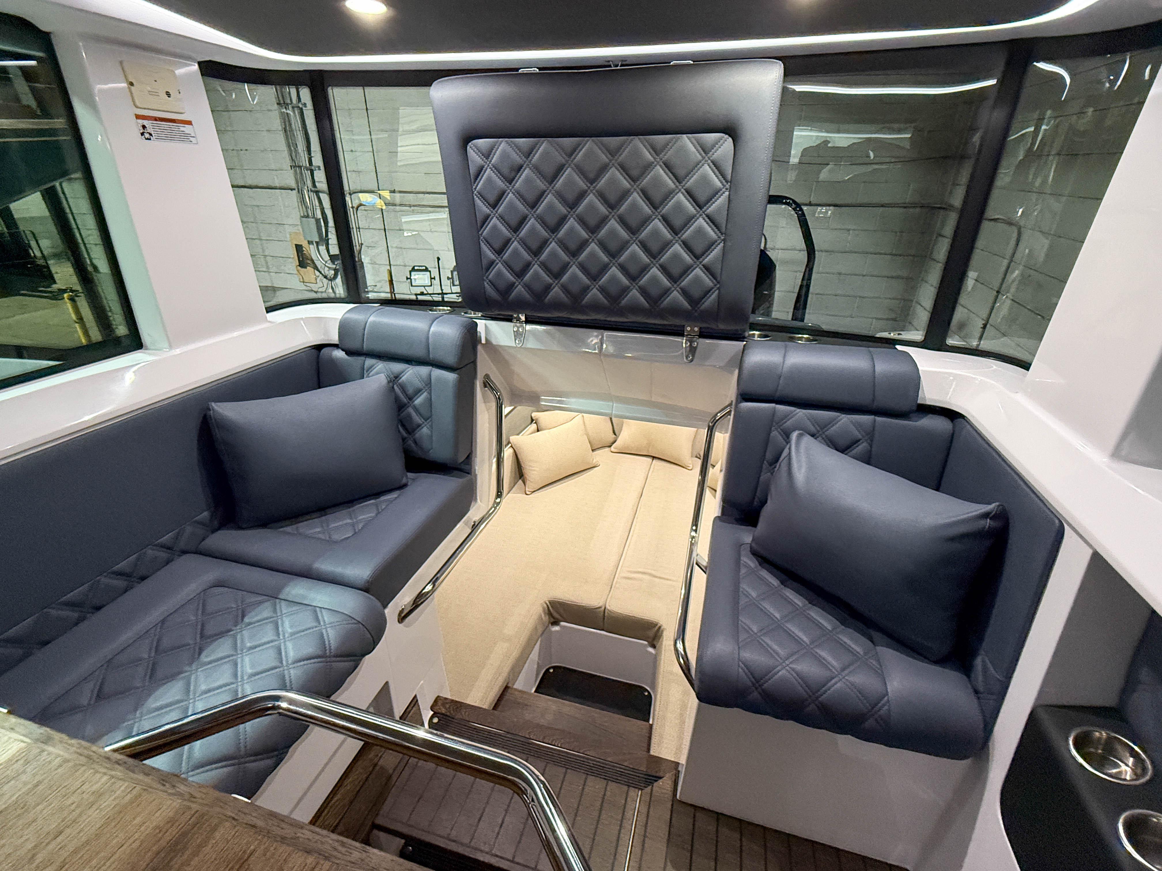 Luxurious interior of 2020 Axopar 37 XC boat with quilted seating and modern design.