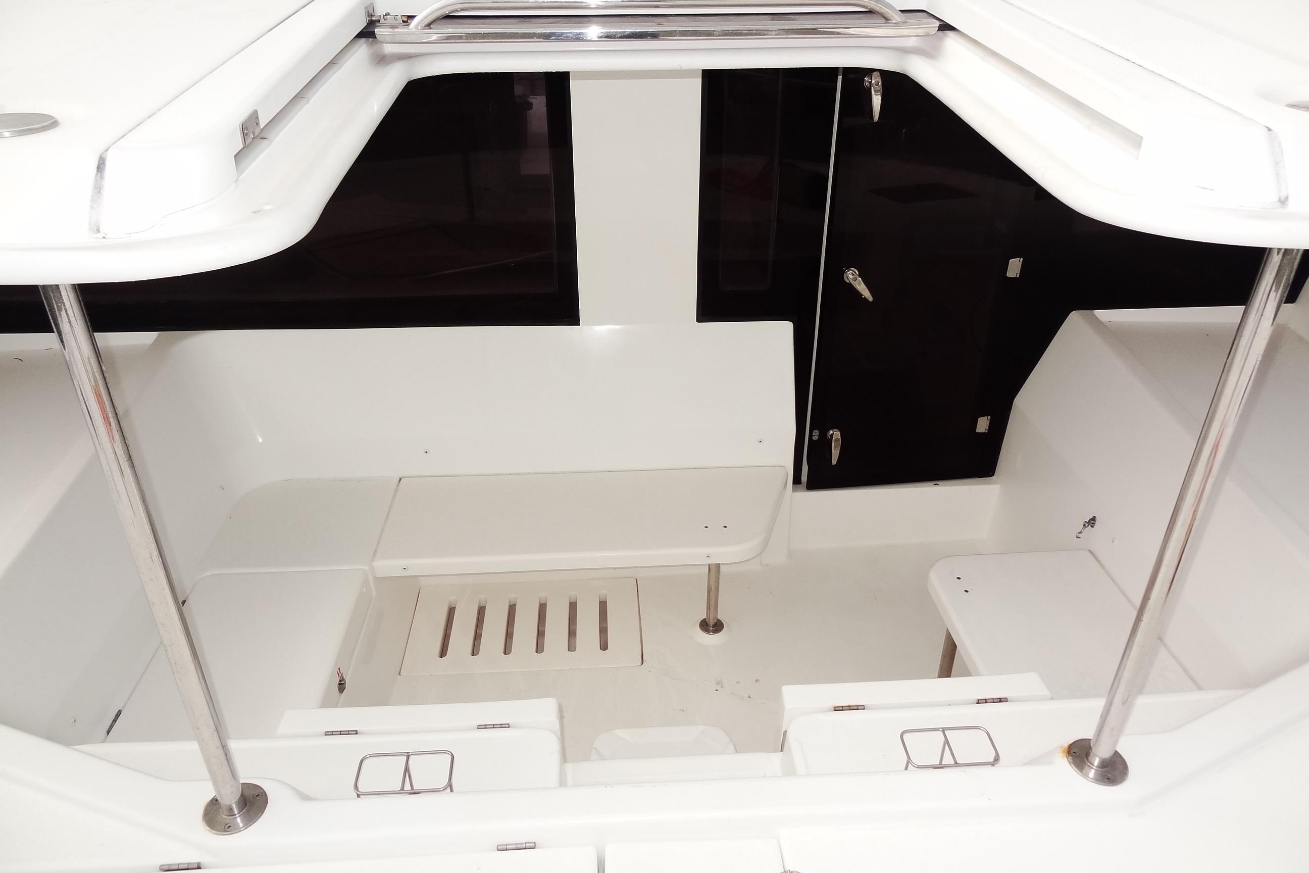 2016 Leopard 51 Powercat interior, featuring sleek white seating and modern design elements.