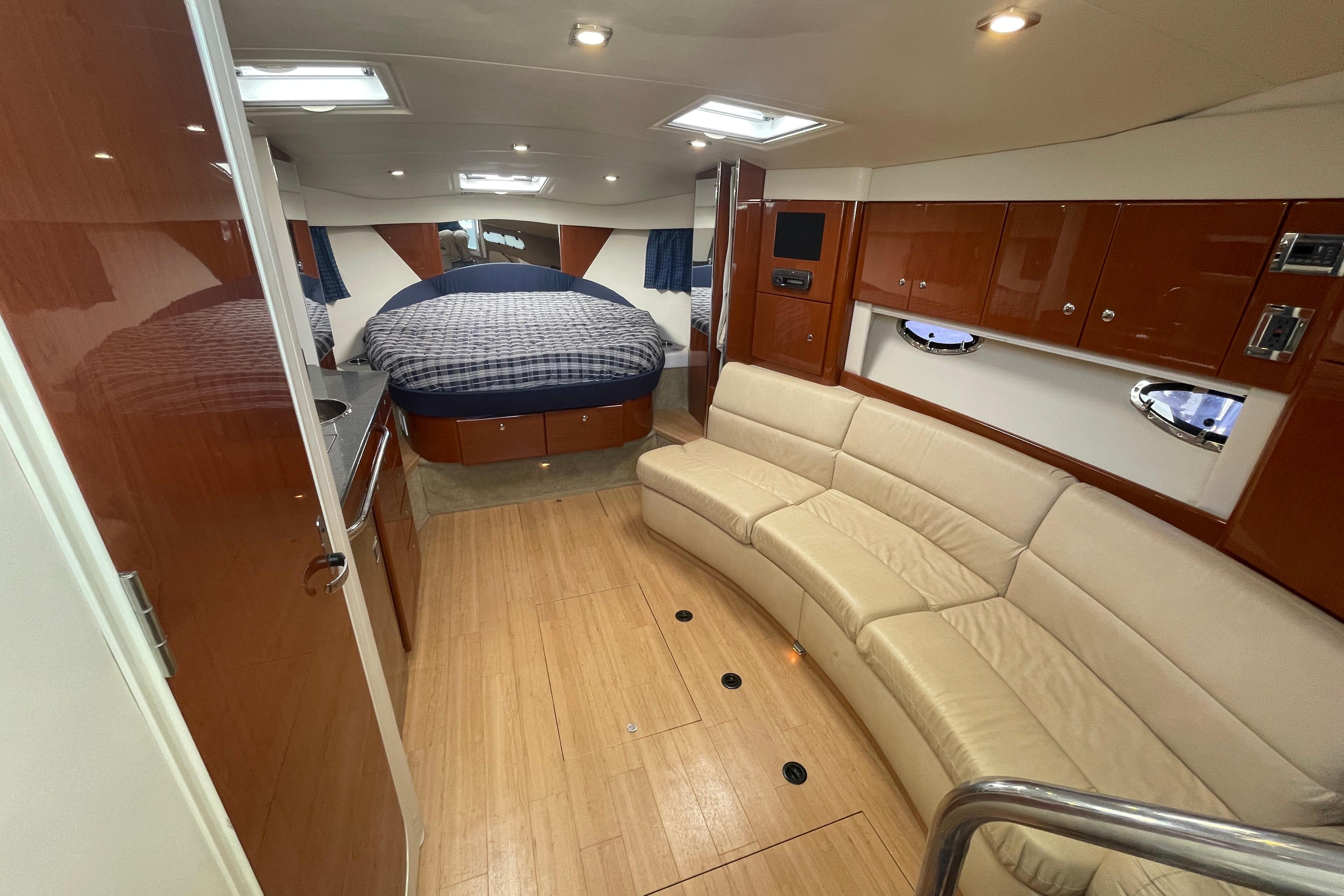 Luxurious interior of 2011 Formula 34 Performance Cruiser with spacious seating and modern amenities.