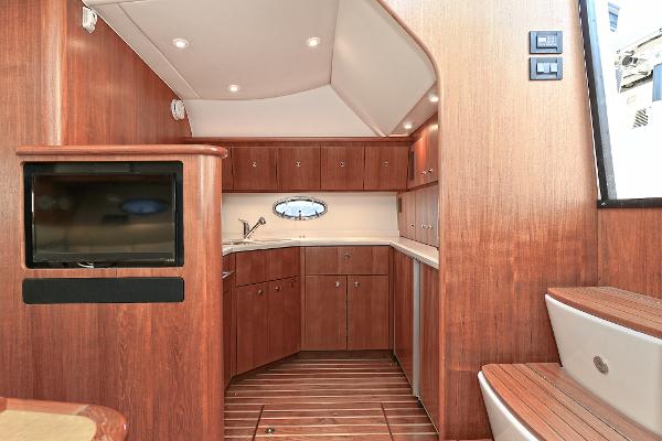 2008 Tiara Yachts 4200 Open interior with wood finish and modern amenities.