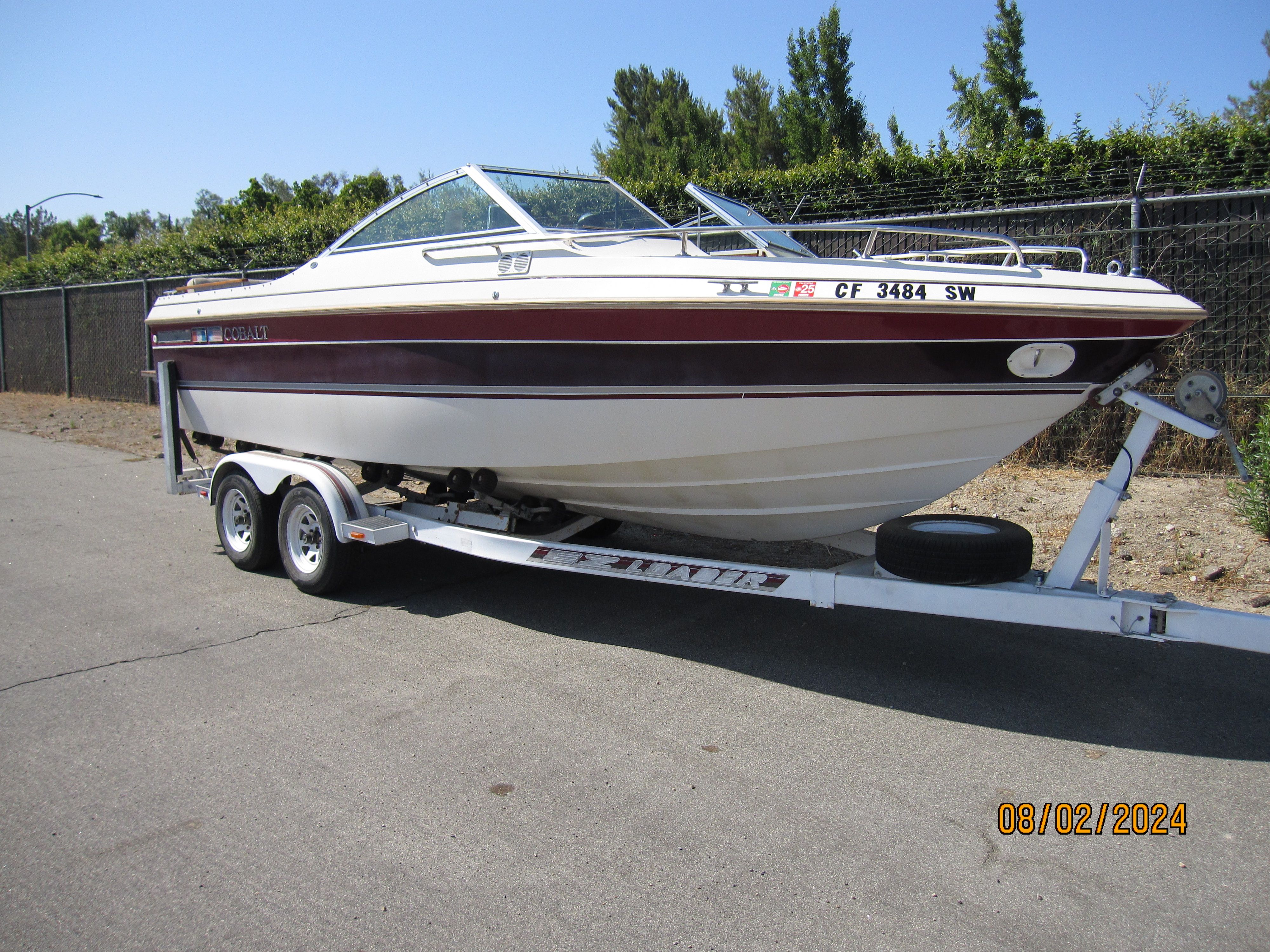 1990 Cobalt Bowrider Classic on trailer, side view.