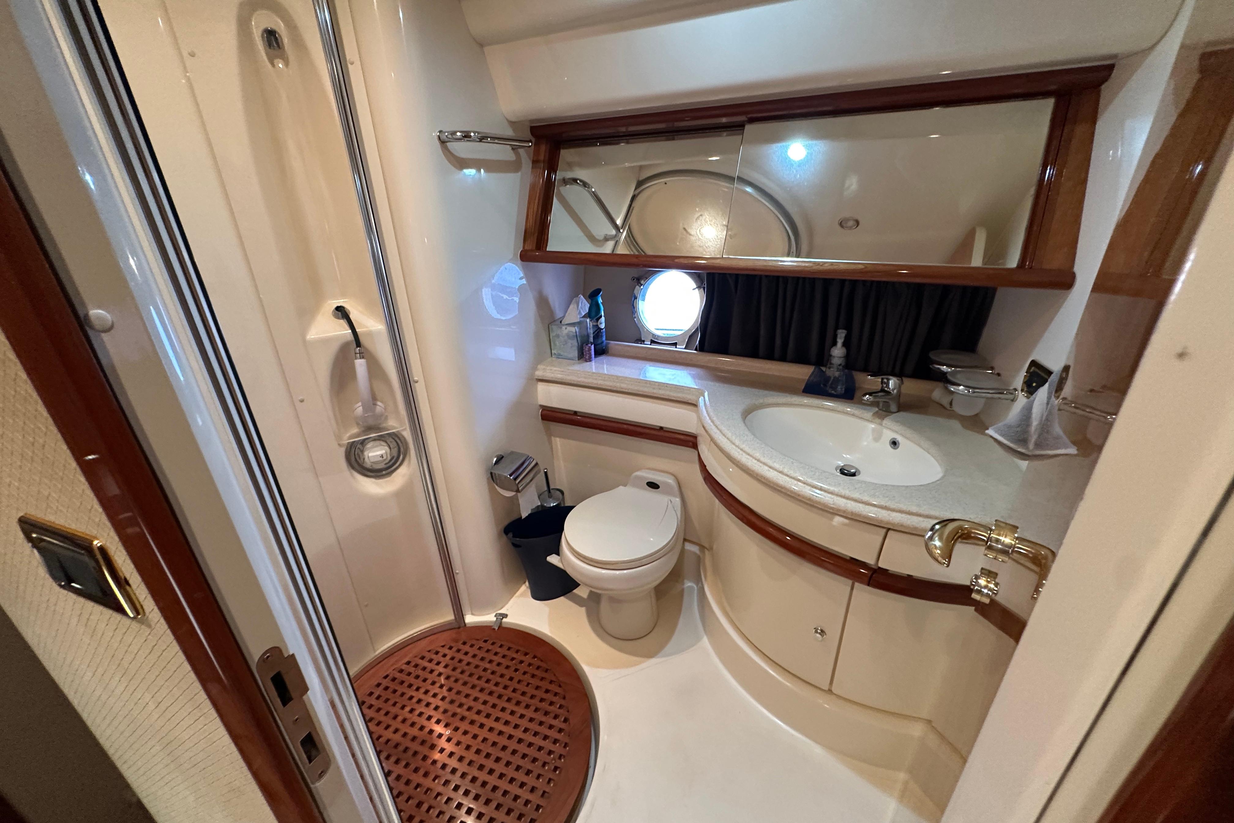 Luxurious 2004 Azimut 55E yacht bathroom with elegant fixtures and modern amenities.
