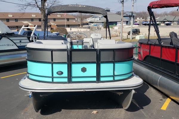 2023 South Bay S224RS25 pontoon boat in parking lot.