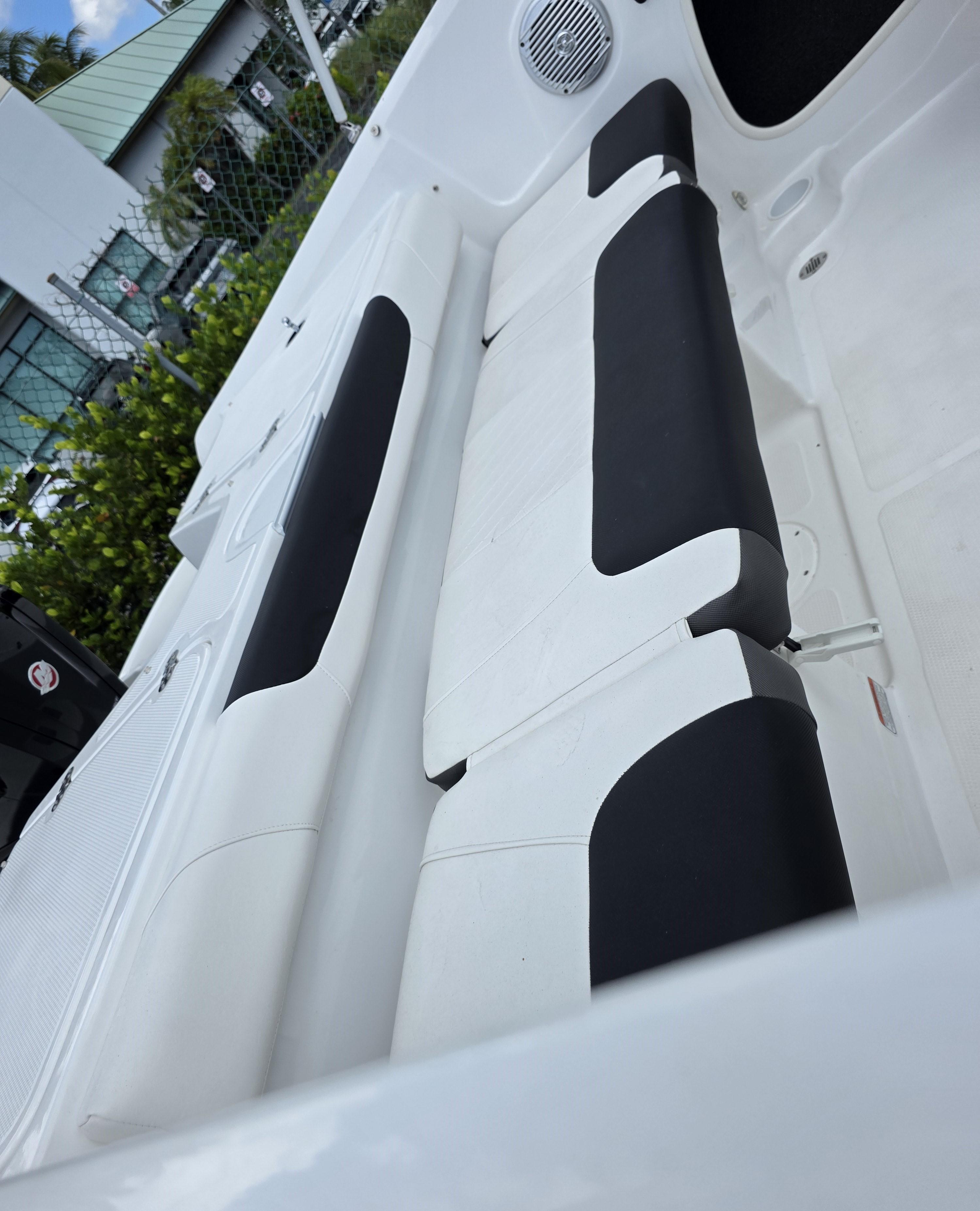 2024 Tahoe 185 S boat interior with black and white seating.