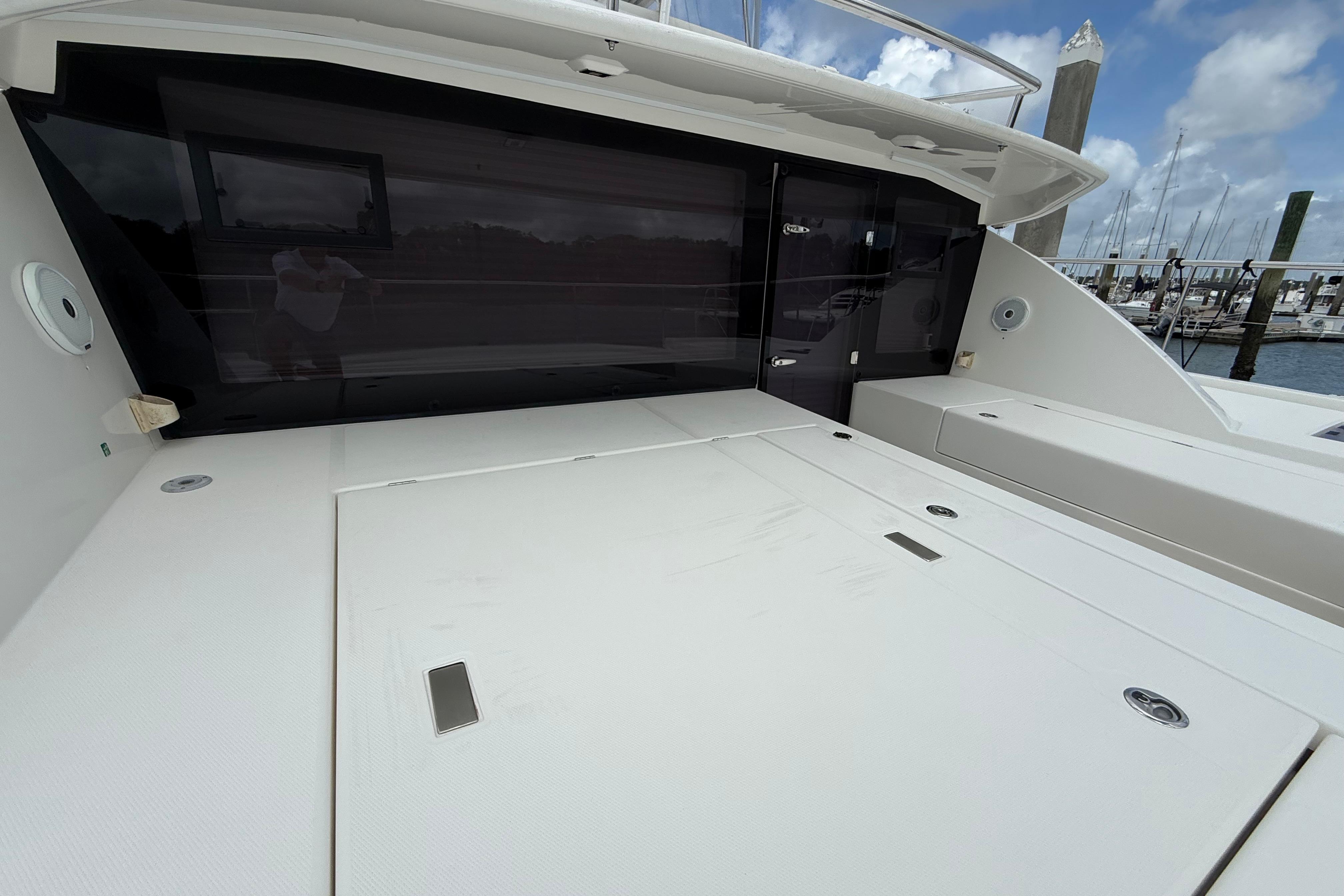 2021 Leopard 43 Powercat yacht deck with sleek design and marina view.