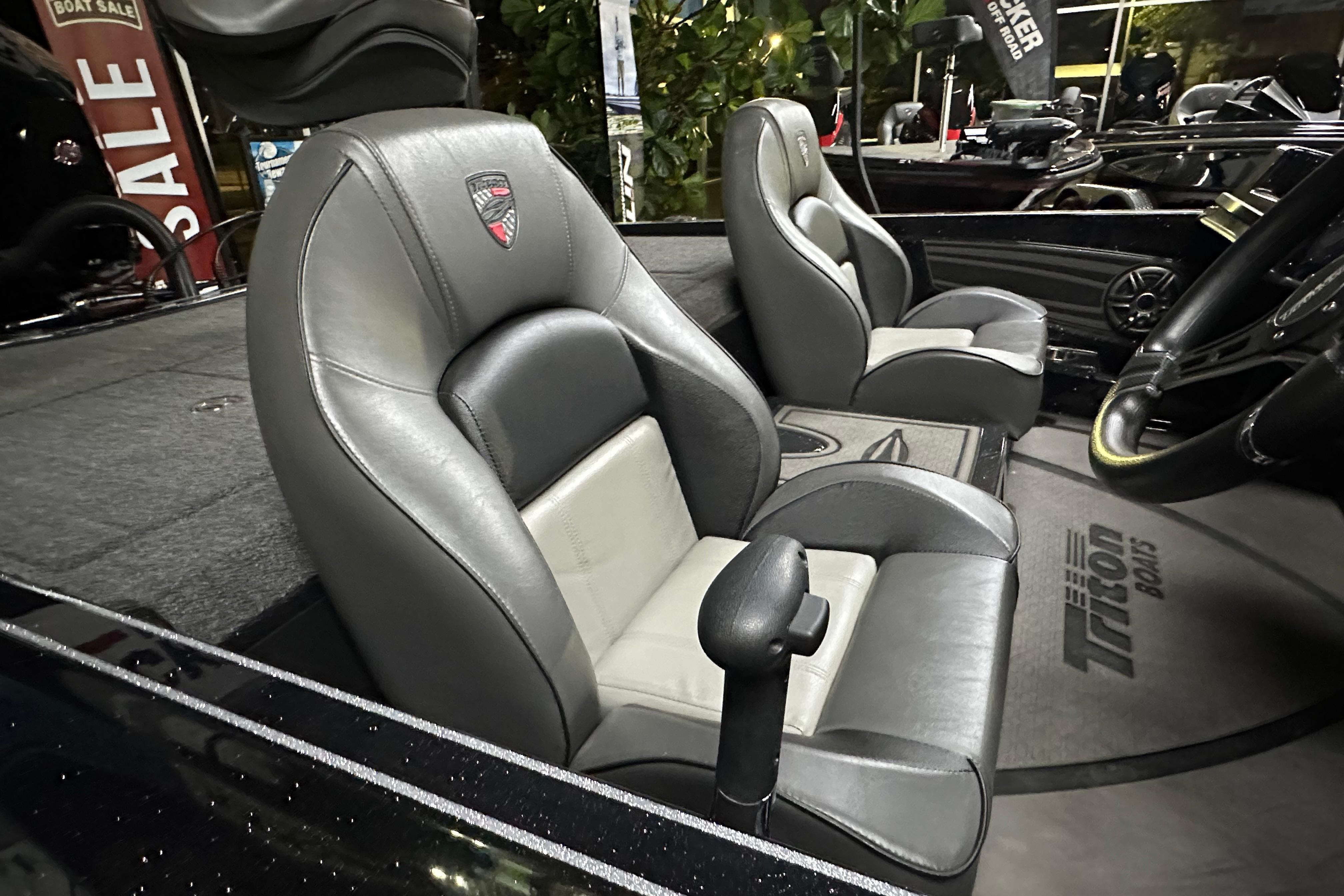 2025 Triton 21XP Patriot boat interior with premium seating and steering wheel.