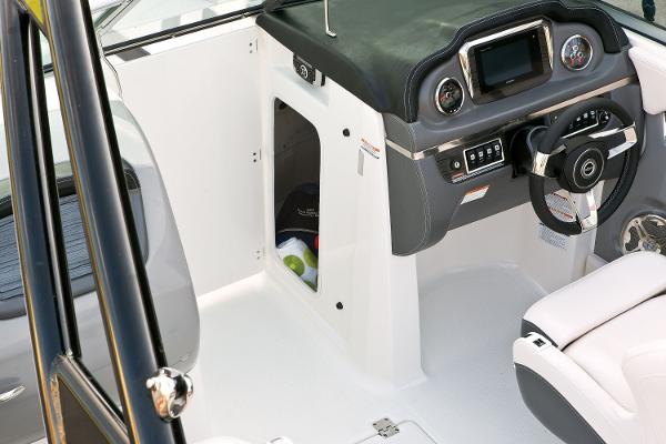 Manufacturer Provided Image: 2016 Chaparral 246 SSi boat cockpit with steering wheel and control panel.