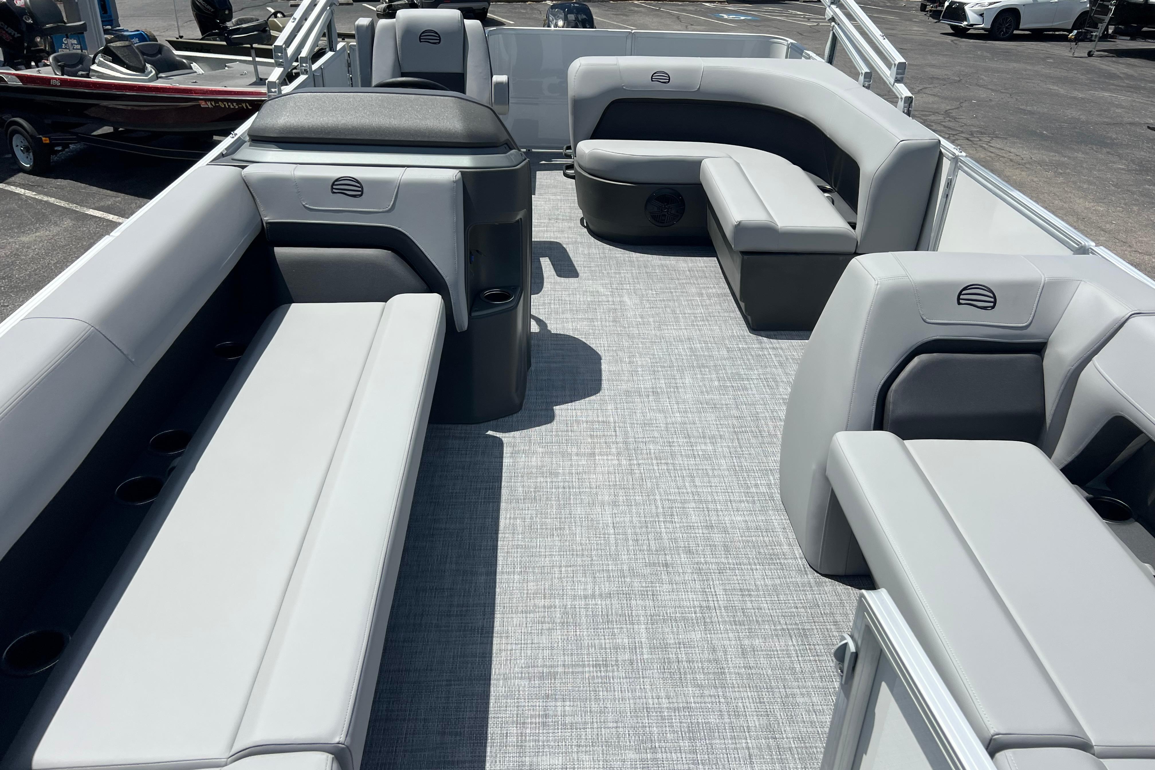 2026 Sun Tracker Party Barge 18 DLX interior with spacious seating and modern design.
