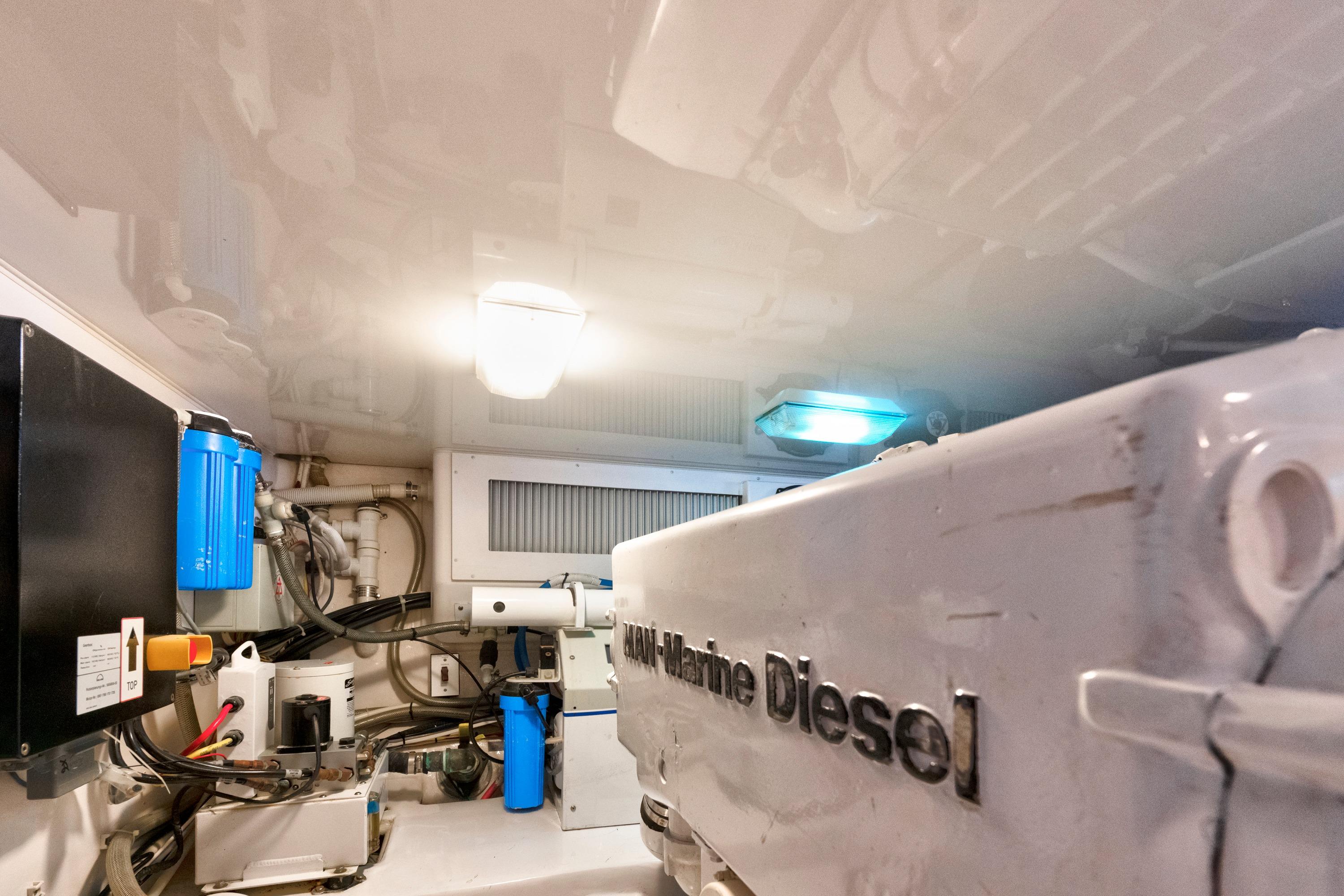 Engine room of 2009 Viking 50 Convertible yacht with marine diesel engine.