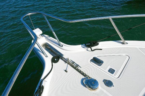 Bow of 2008 Tiara Yachts 4200 Open, featuring stainless steel railings and anchor system.